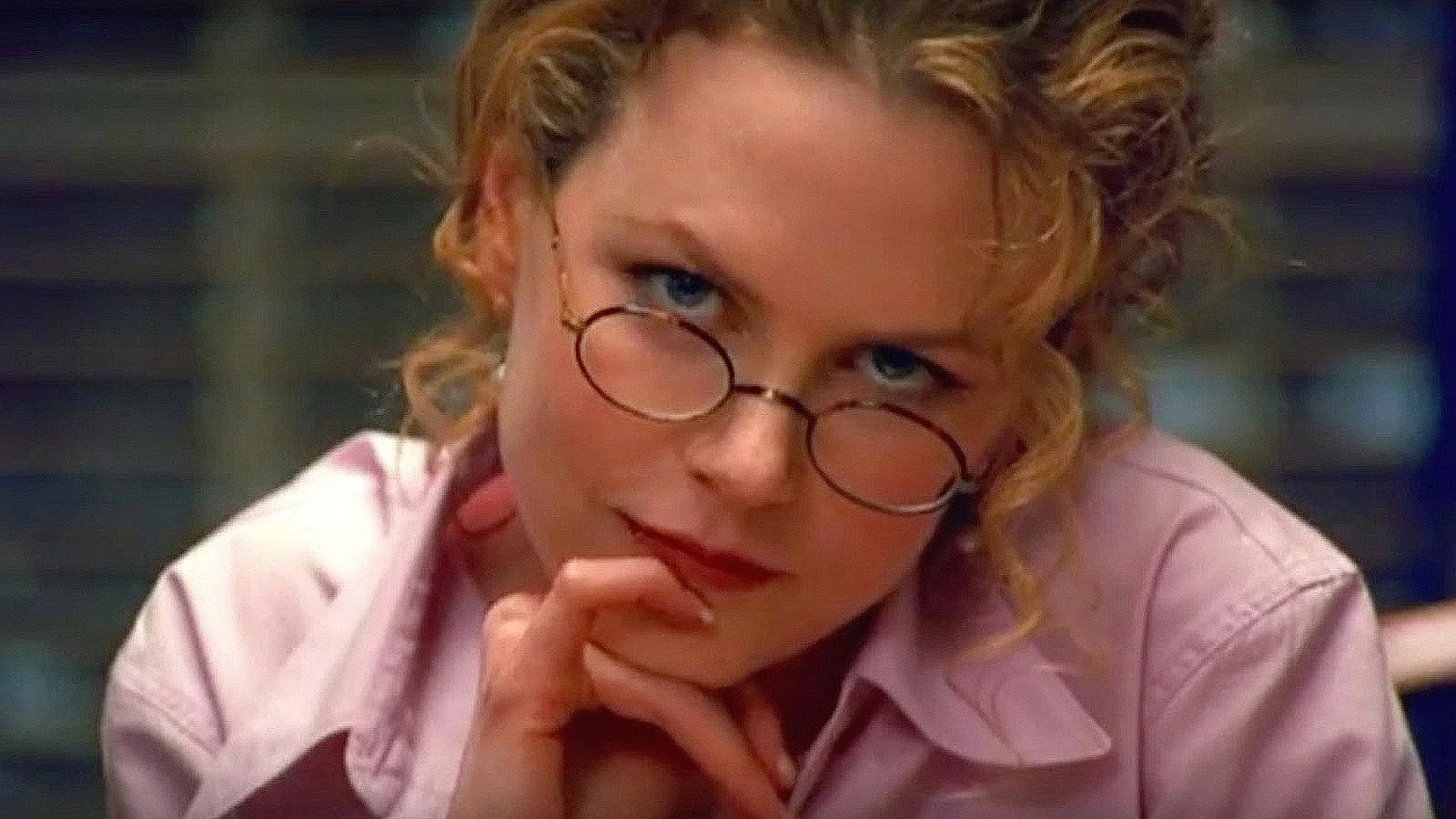 The “Kubrick Stare”: when his characters look directly at the camera with head tilted slightly down—as Nicole Kidman does in this shot from Eyes Wide Shut (1999)