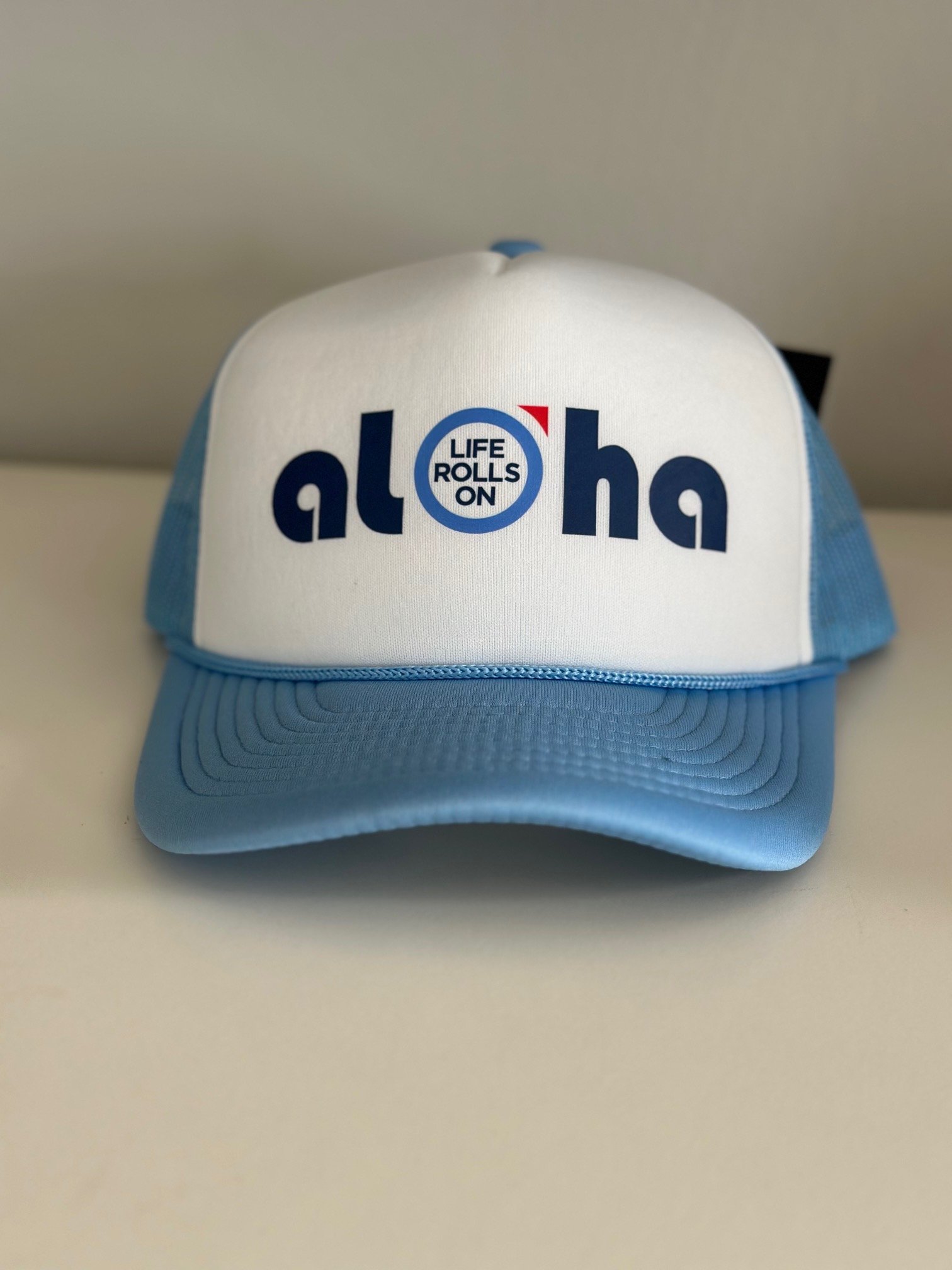 sky blue hat front.jpeg