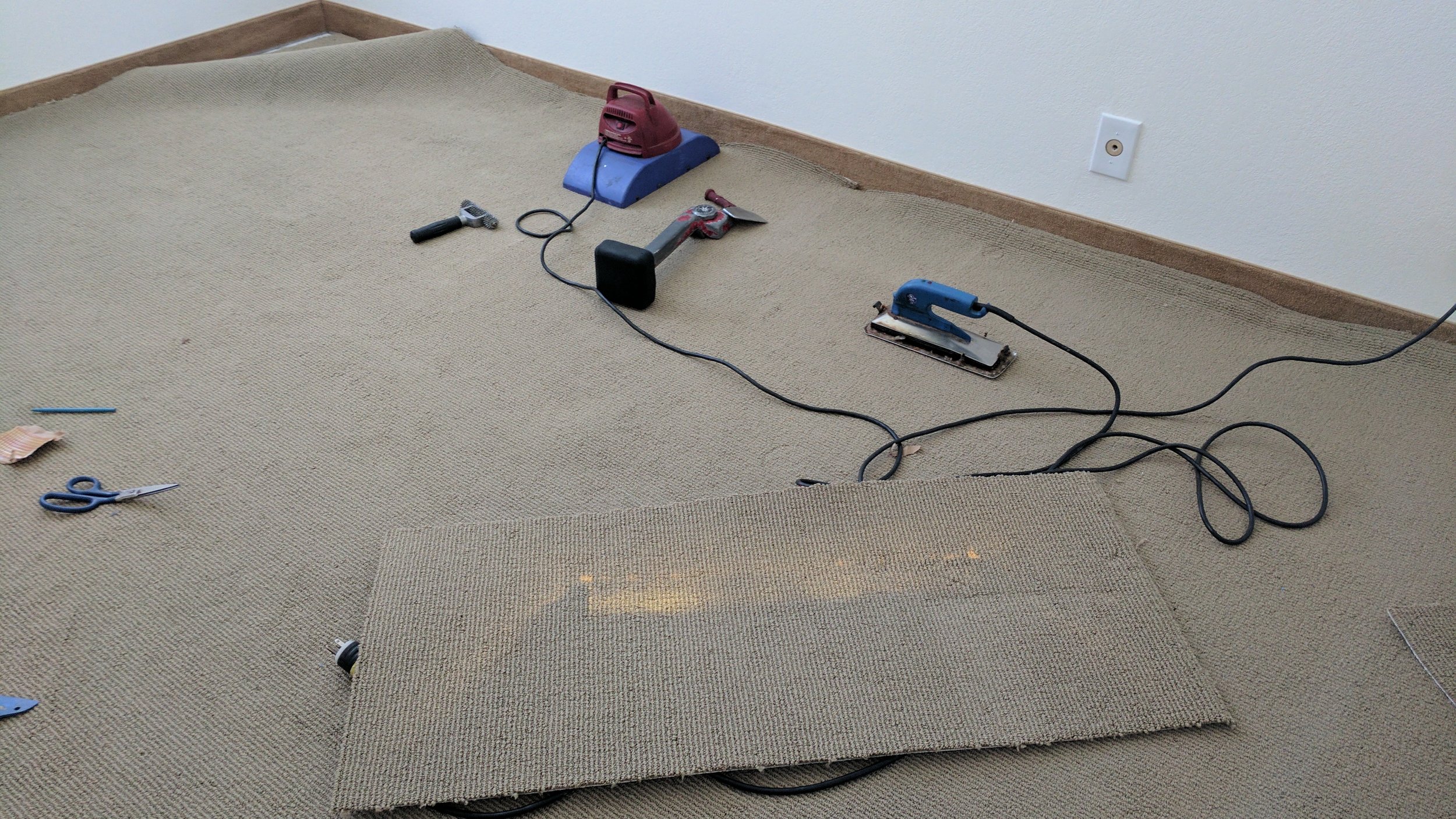 We carefully cut out the damaged section, prepared a matching donor patch, and used professional seaming irons to bond it perfectly.