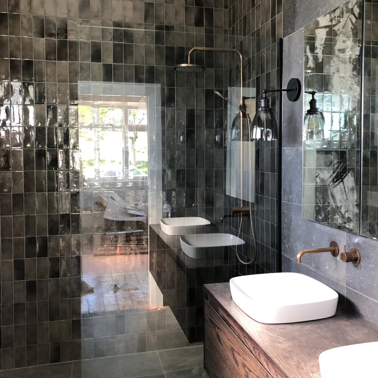 Beautiful dark tiles from Artedomus https://www.artedomus.co.nz/ Tapware and vanity from Plumbline https://www.plumbline.co.nz/