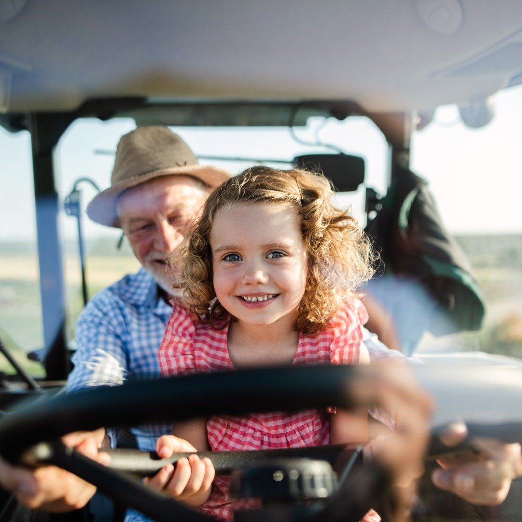 senior-farmer-with-small-granddaughter-sitting-in-tractor-driving.jpg_s=1024x1024&w=is&k=20&c=v12uZIhgroJB9IRoSCzokqx0wiXTBMNM0ZBLR5Xt6uw=.jpg