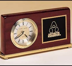 Rectangle Clock Rosewood piano finish with brass base. Diamond spun dial and 3 hand movement that is guaranteed for life. Price of $86.00 does not include engraving. Engraving is the greater of $24 or 30¢ per character. Overall size is 4″ x 7 5/8″.