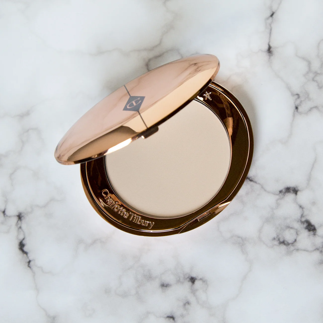 Charlotte Tilbury Airbrush Flawless Finish Powder in Fair This is totally a YouTube made me buy it scenario. I have a ton of powders right now in pressed and loose formulas, five in total not counting this new one, so I really didn't need it but I wanted to see if the formula is as magical as everyone says it is. To say I had high hopes would be an understatement. As someone with dry skin who doesn't like to set their makeup too much I don't find this as wow-ing as YouTube told me it would be. I was hoping it wouldn't mattify my skin too much since it is so lightweight, major pro, but it did still make me look fairly matte. I do like it a lot more than some of my other powders that I currently own but it's not a must have for me. All in all I don't think it's a bad product and I'm glad I got it so I could try it but I think for my skin type/preference my favorite setting powder is the Hourglass Ambient Lighting Powder since I like a dewy to natural skin finish. I ended up getting this for $40.50 from the retailer Feel Unique by using Charlotte Tilbury as my Brand for Life (a promo where you get 10% off any brand you select for the next six months). I wouldn't necessarily recommend Feel Unique since their shipping to the states takes almost a month which is absolutely ridiculous in my opinion. 