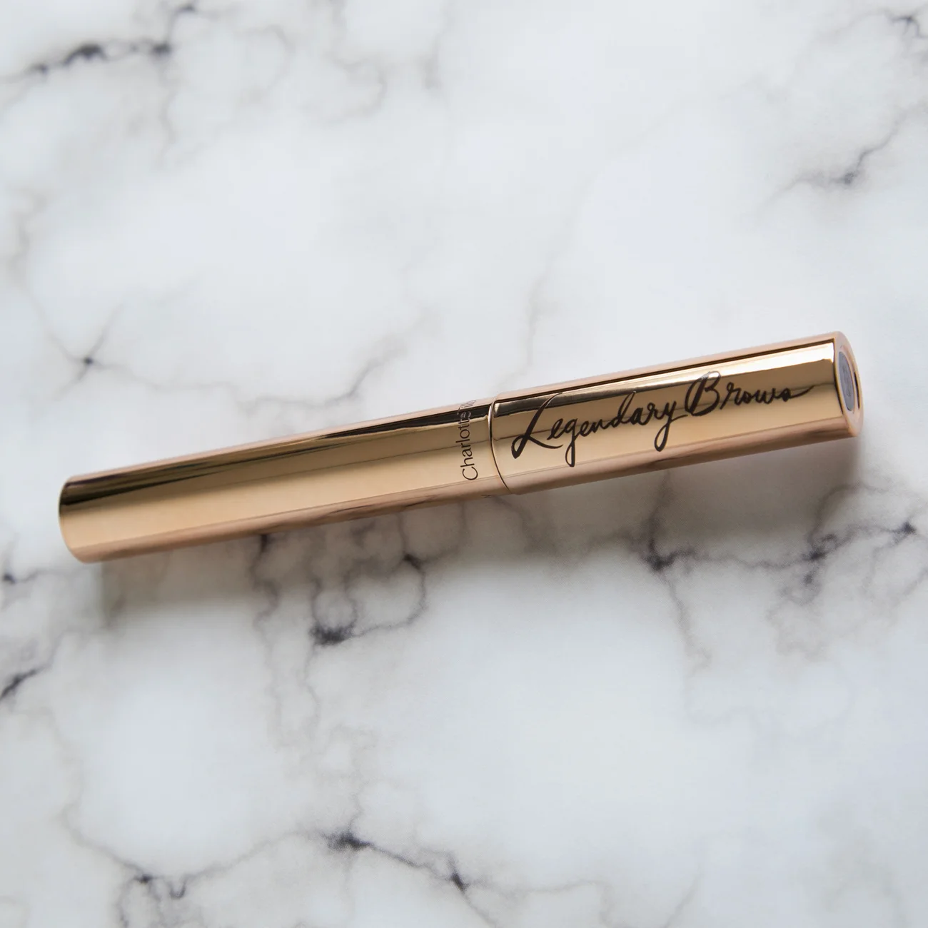 Charlotte Tilbury Legendary Brows in Clear This whole summer haul was meant to stop with Tarte so let's just take that in for a minute since we're actually only a little over halfway through. When I was watching a YouTube video an add popped up for Charlotte's Summer sale, 30% off select items, and I freaked out a little. Last year I bought the Filmstar Bronze & Glow from the Norman Parkinson collaboration in the sale and absolutely loved it. I thought it was making me break out and ended up depoting and throwing away the creams but I kept the packaging since it is so beautiful. Turns out it wasn't that and now I'm super sad that I tossed the product - think my skin was just going through a rough patch. I'd been wanting to try her clear brow gel since I'm a clear brow gel kind of gal so I was really happy to see it in the sale. I grabbed it for $15.75 but it was further reduced during the sale to $13.50. I'm currently using the Lancôme Sourcils Styler Brow Styler in transparent and I love it but I decided to crack into this just to test it out so I could tell you about it. The hold isn't quite as strong as my Lancôme one but it's still decent, out of the very few brow gels I've tried I'd say it's comparable to the Marc Jacobs one. I love the tiny brush on this and can definitely see why the colored versions are so popular since it really grabs on to every hair. It's not my favorite brow gel ever but I'm not mad that I got it either and I will happily use it. 