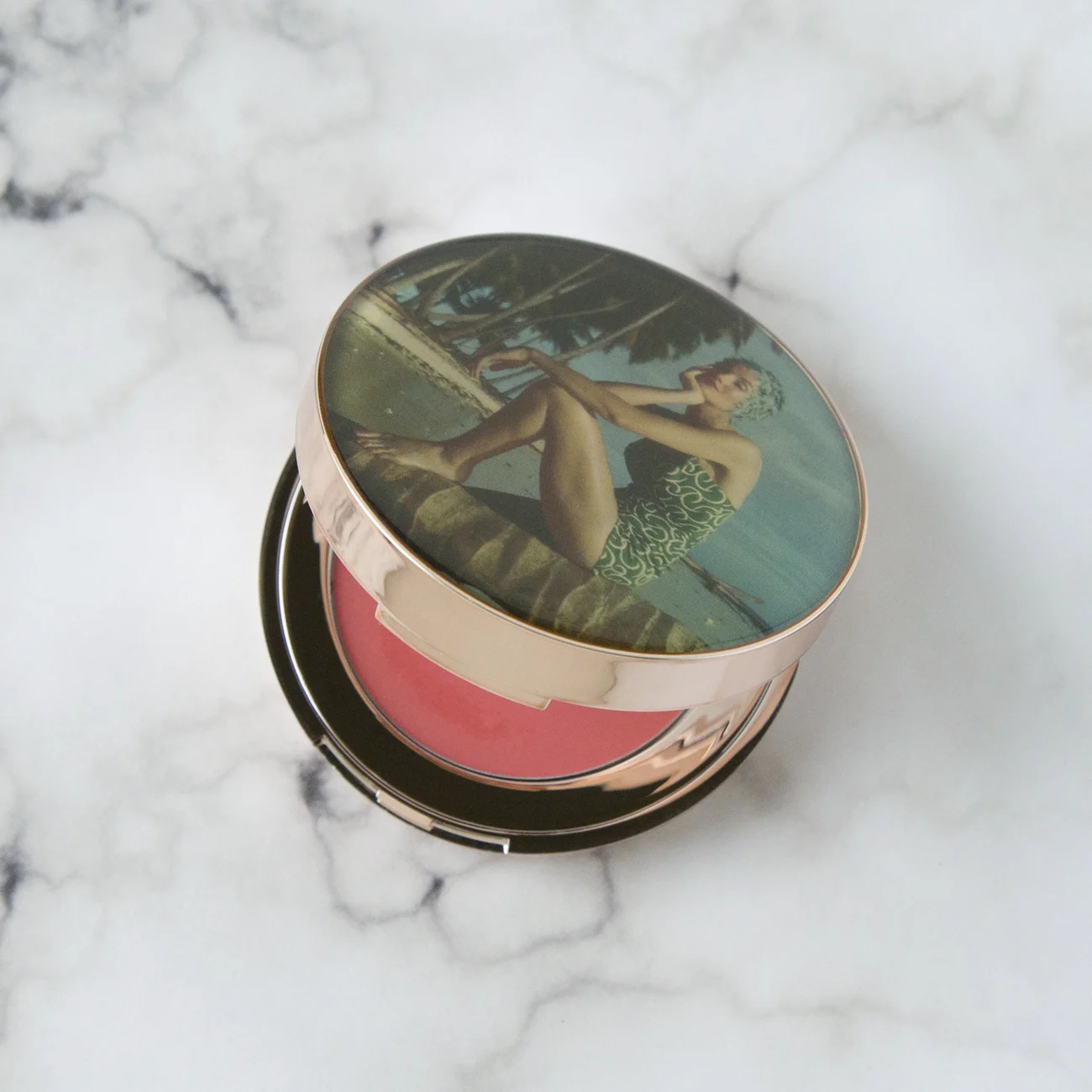 Charlotte Tilbury X Norman Parkinson Colour of Youth 10/10 did not need another peachy-pink cream blush but gosh darnit I love the packaging so much on the Norman Parkinson collection that I decided to go back in the sale a second time and grabbed this. The color is very similar to the other two cream blushes I have, Clarins Multi-Blush Cream Blush in Candy and Josie Maran Argan Color Stick in Pink . I can see myself getting a lot of use out of this in the winter when my skin gets extra dry because this is the most hydrating/balmy feeling cream blush out of the three. I have worn it once since I got it and I really like the way it applies and feels on the skin - it's more buildable and blends easier than my other two cream blushes. I paid $34.80 but the full price was originally $58 so I think I got a pretty good deal. Not sure how much use I'll get out of it since I'm overwhelmed with options in this color but the packaging is so stunning that I'm not mad about it.