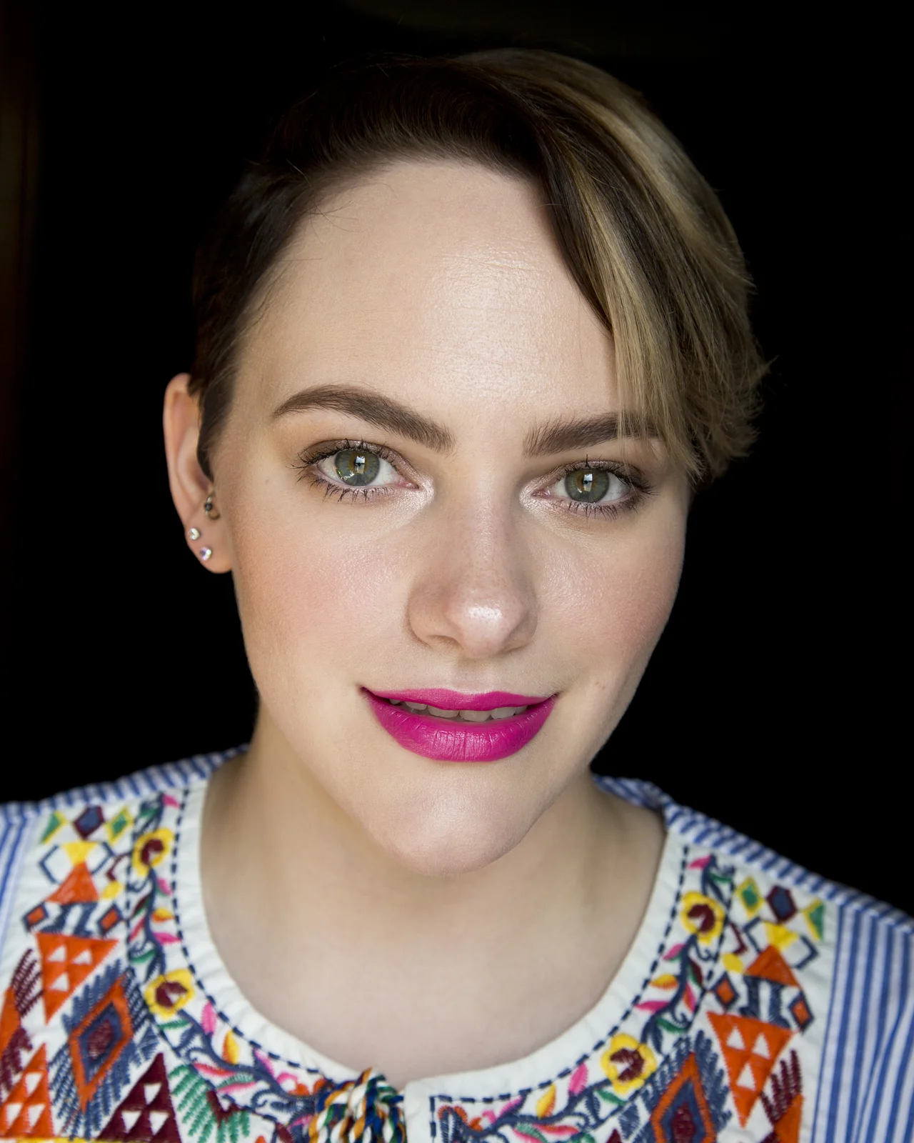 Clara is described as a bold rose but I would say it's more of a bold magenta or fuchsia since it's a very bright pink.