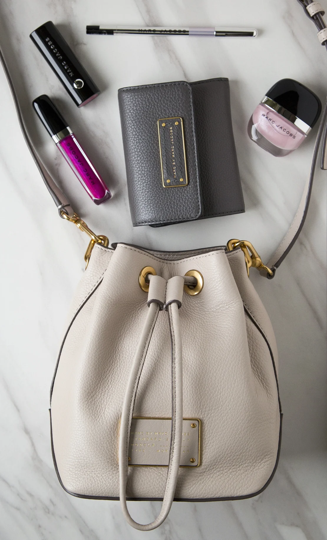 In true Heather fashion right after I posted my " What's New In My Wardrobe? " blog post I went and bought a new wallet. It's also Marc by Marc Jacobs and my OCD senses made me photograph all my Marc Jacobs stuff in one photo so here it is!