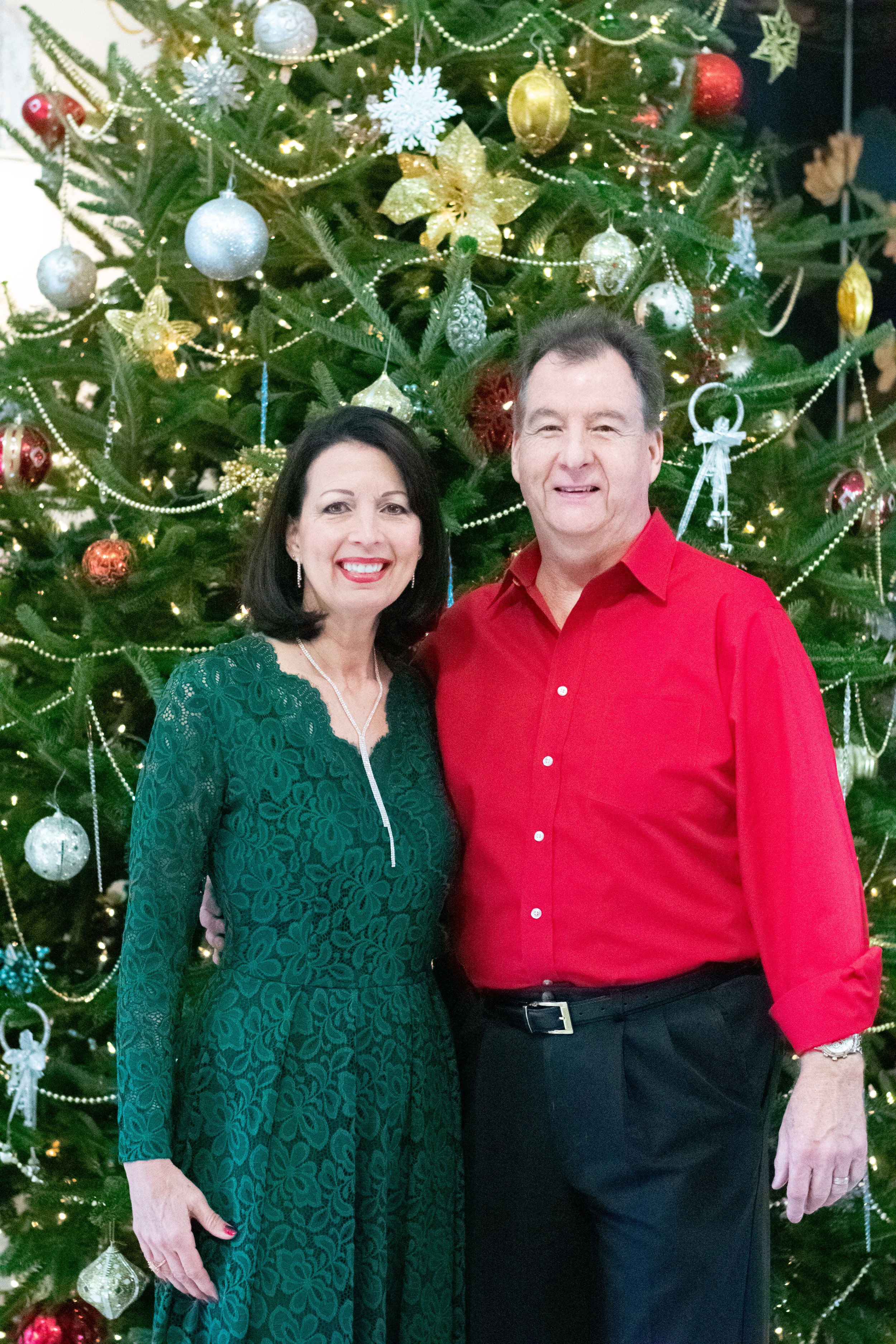 Kelly and John by Christmas tree-smaller.jpg