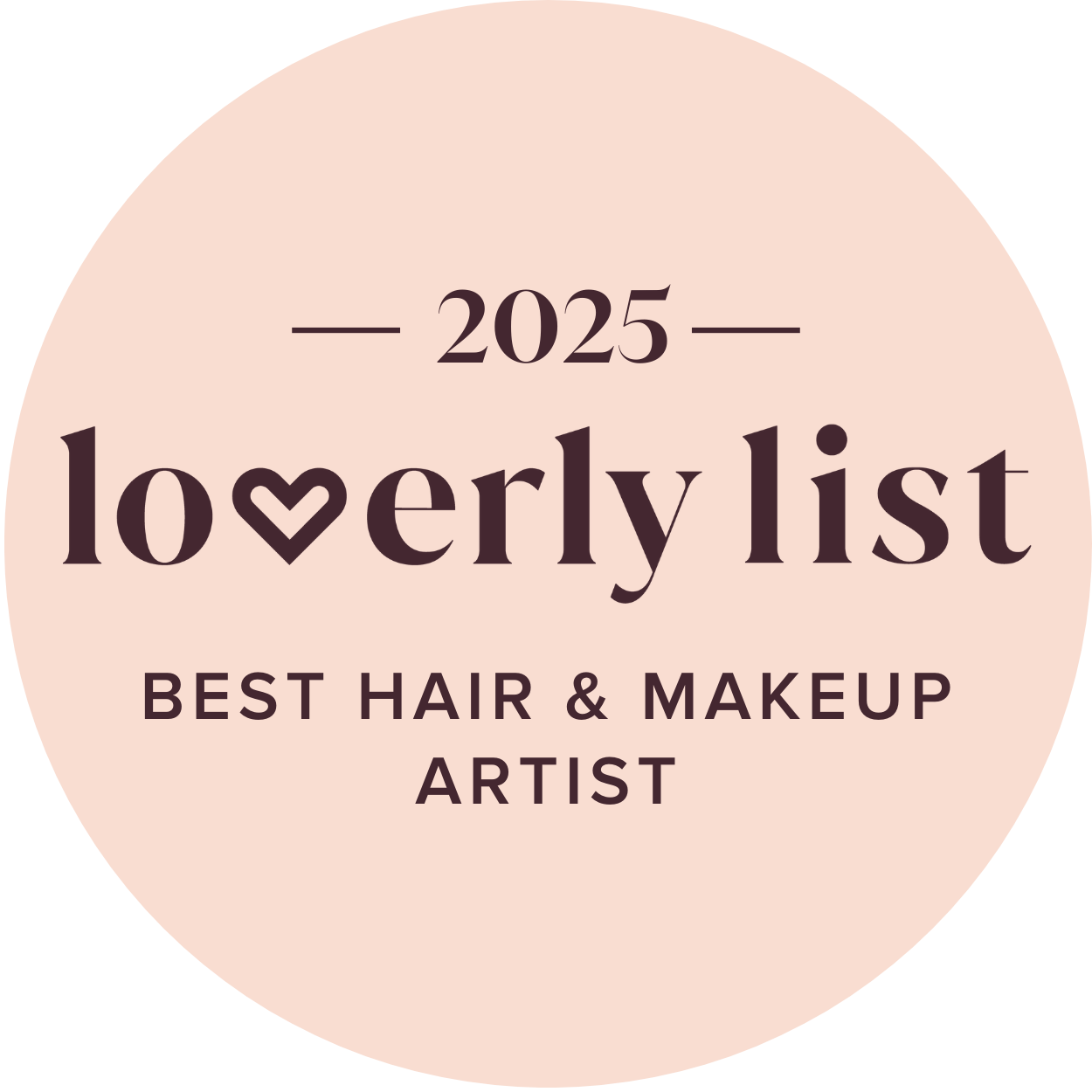 A circular badge with a light pink background, featuring text that reads "2025 loverly list, Best Hair & Makeup Artist" with a heart shape replacing the letter "v" in "loverly."