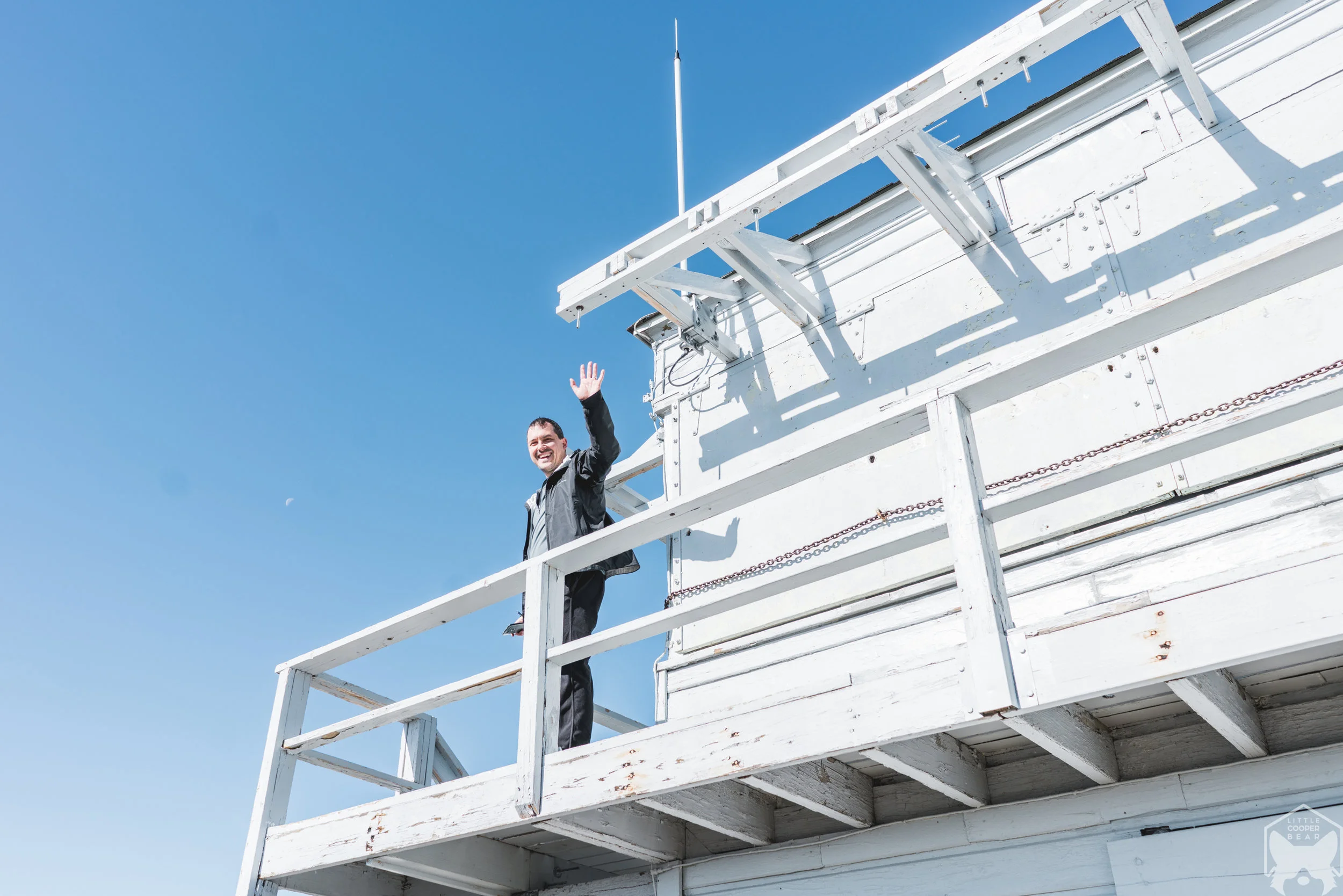 Nacho's dad waved hello from the lookout tower.