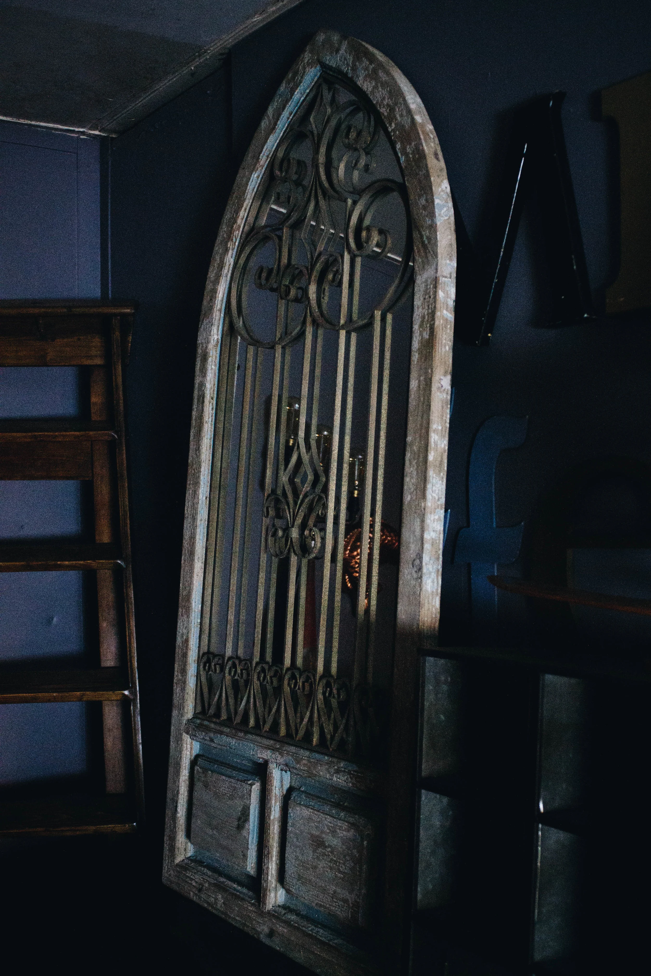 Large Distressed Arched Window Mirror with Fancy Metal Work