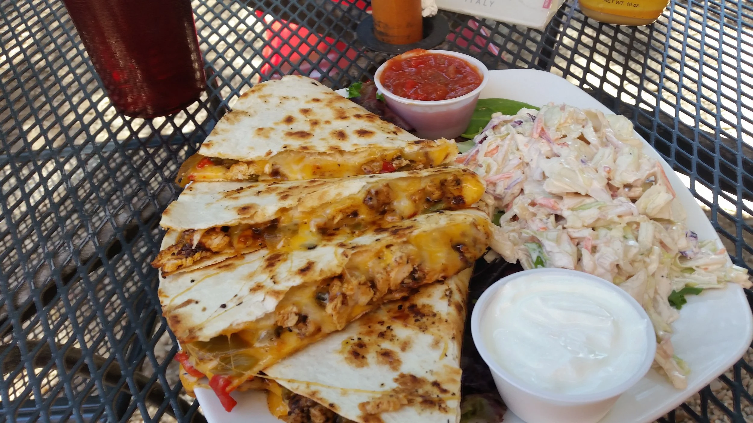 Chicken, green chile and cheese quesadilla with coleslaw at The Hollar in beautiful downtown Madrid