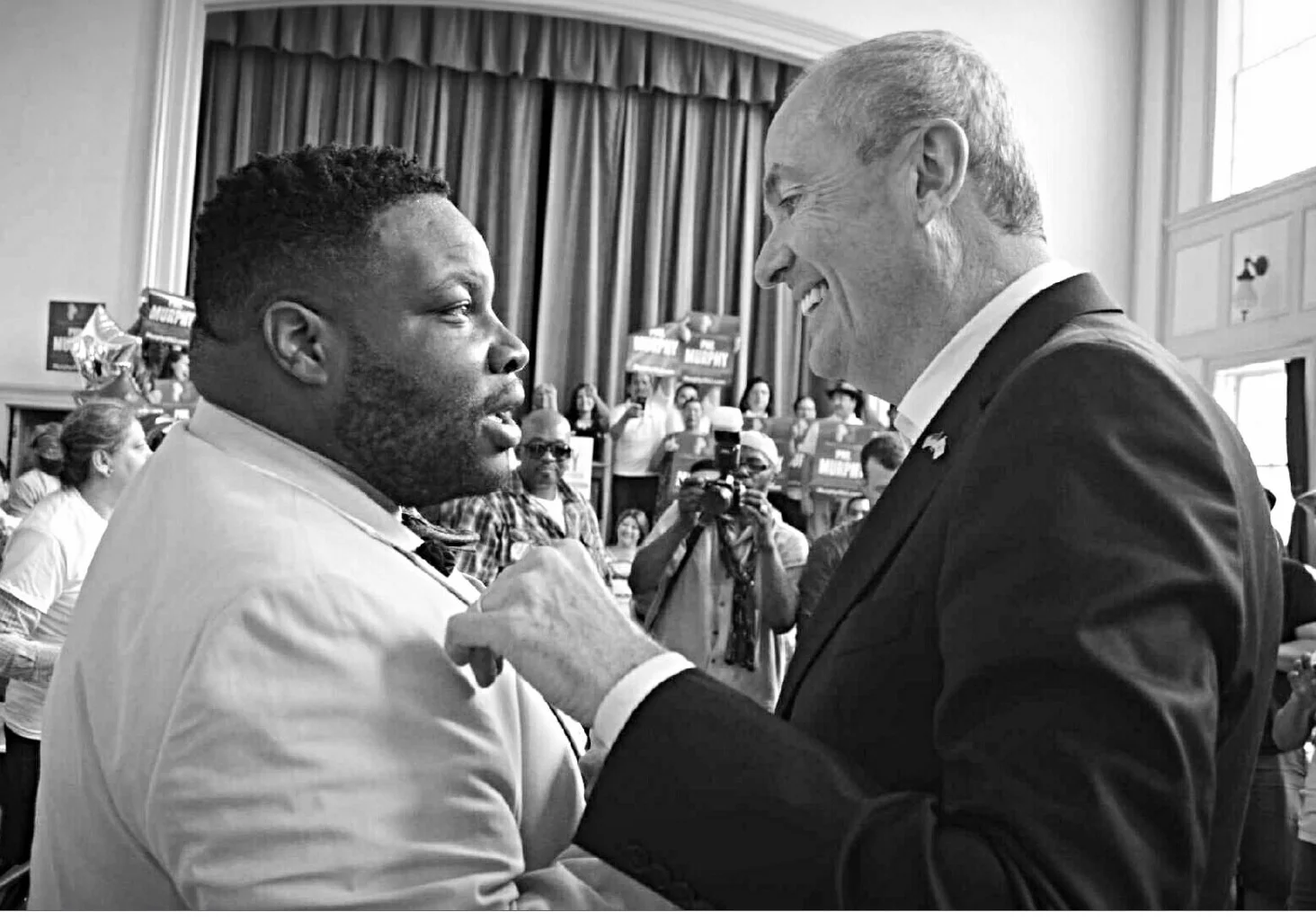 Roosevelt J. Donat, Special Counsel and Director of Government Affairs at Murphy Partners LLP, celebrates with Phil Murphy, Democratic nominee for New Jersey governor.