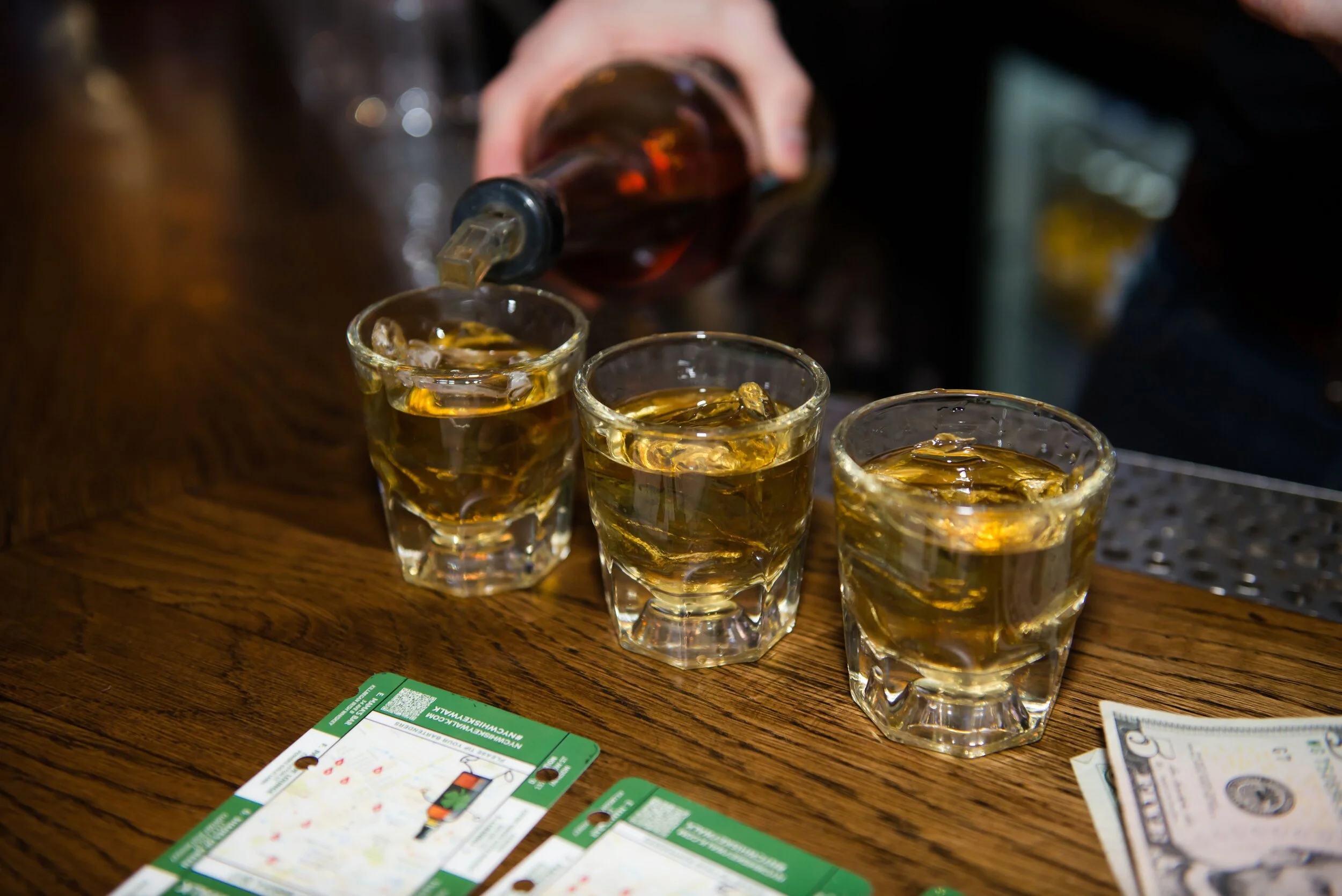 Philly Whiskey Walk text overlaid whiskey glasses