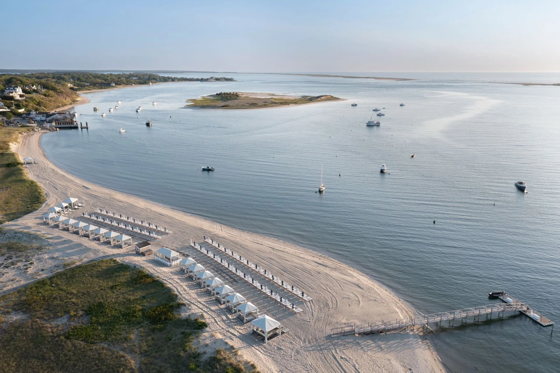 Aerial view of the beach and dock at Chatham Bars Inn, facing the harbor
