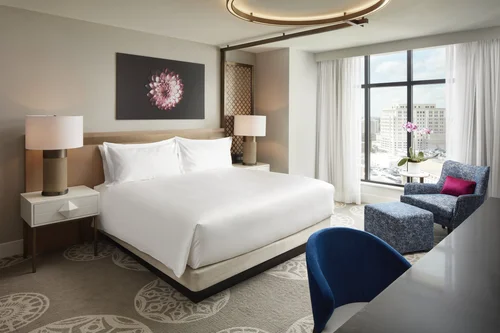 Loews Coral Gables — Grand Corner Suite king bedroom