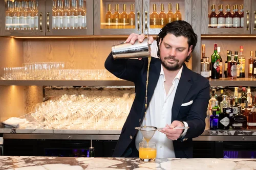Pazzo Ristorante Halifax — bartender mixing a cocktail
