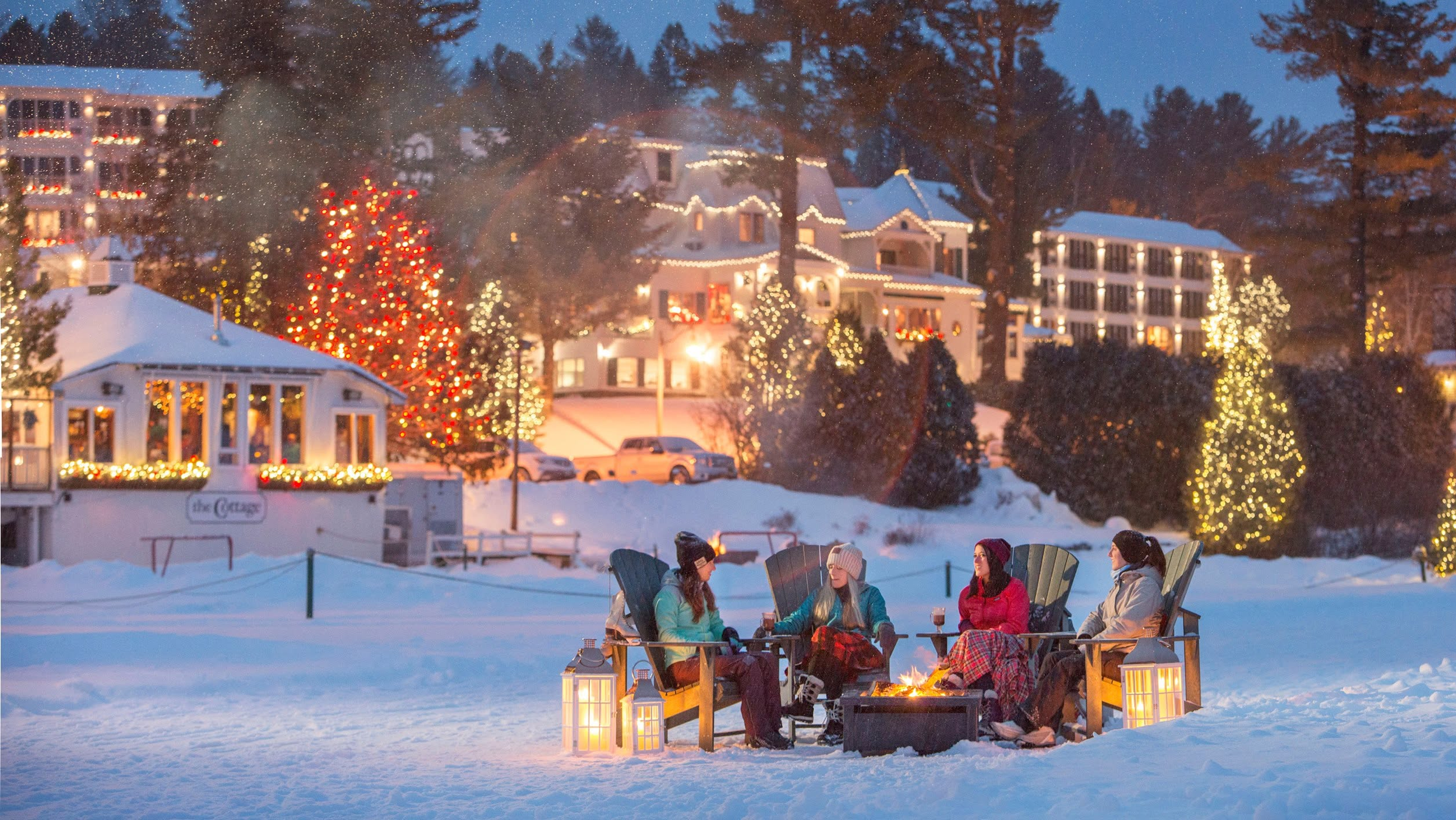 Snow falling on Lake Placid village and Mirror Lake in winter