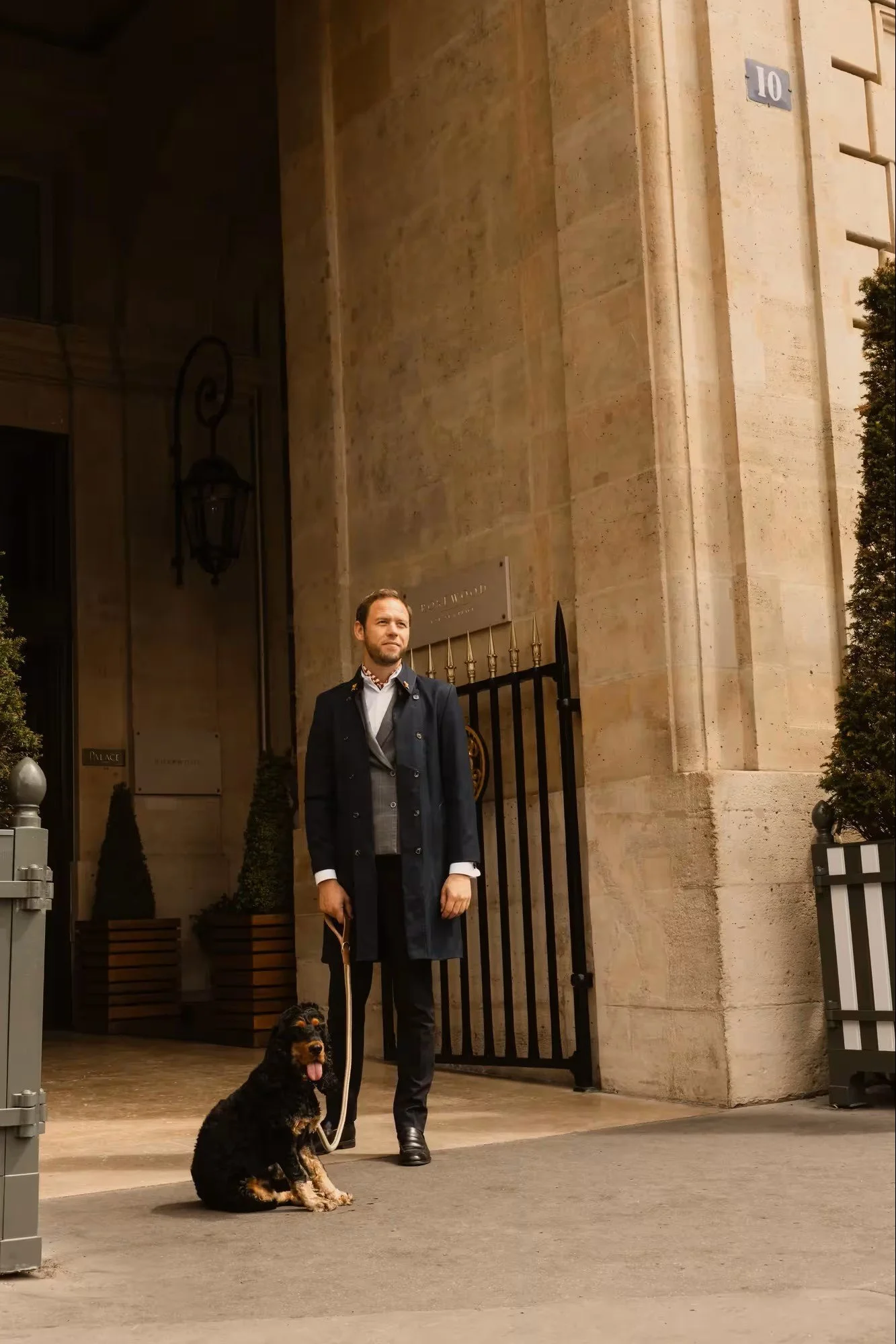 The concierge team at Hôtel de Crillon, A Rosewood Hotel, with a canine guest