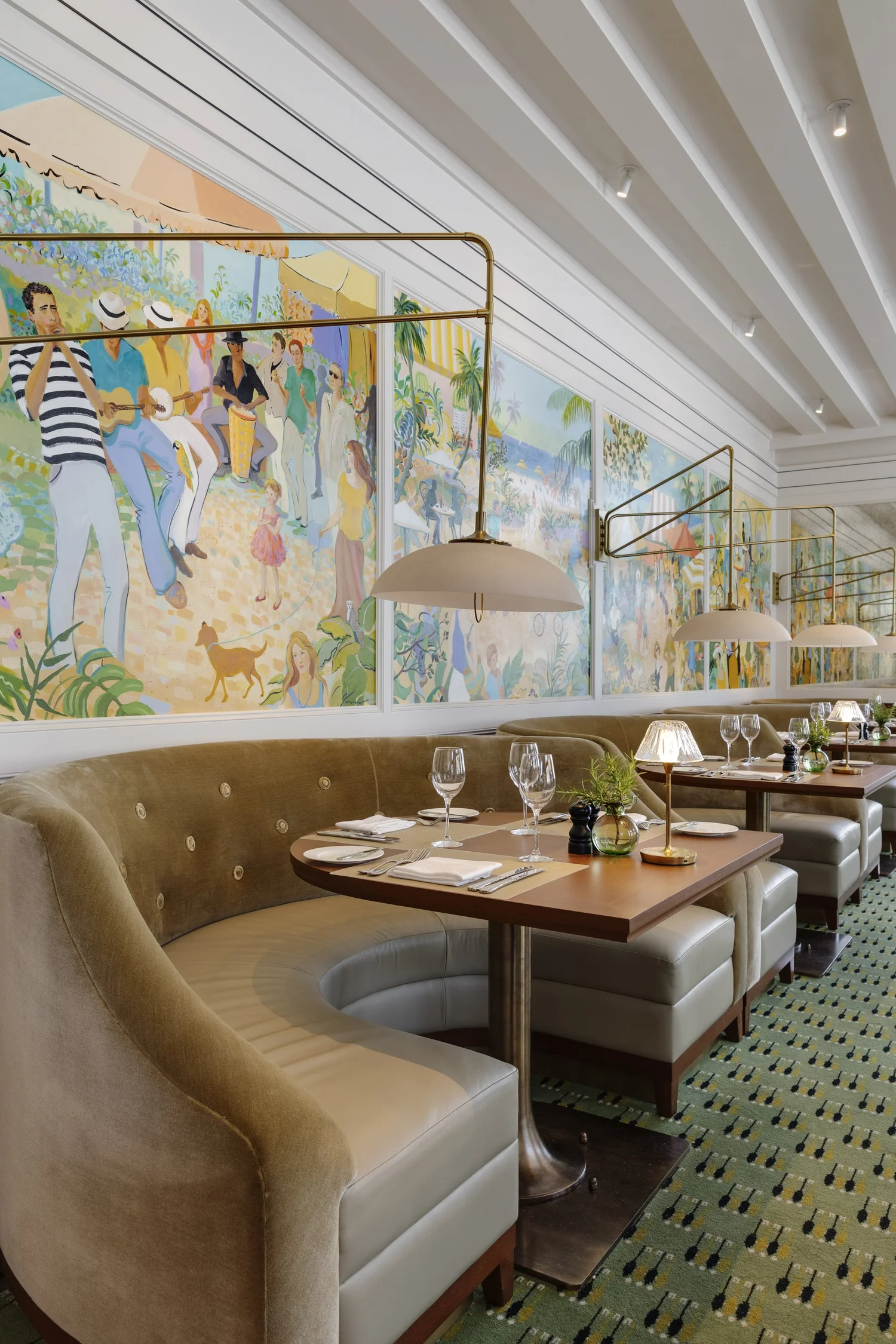 Annie's Bistro, Bar and Bakery at Olde Naples Hotel with impressionist murals and a marble bar