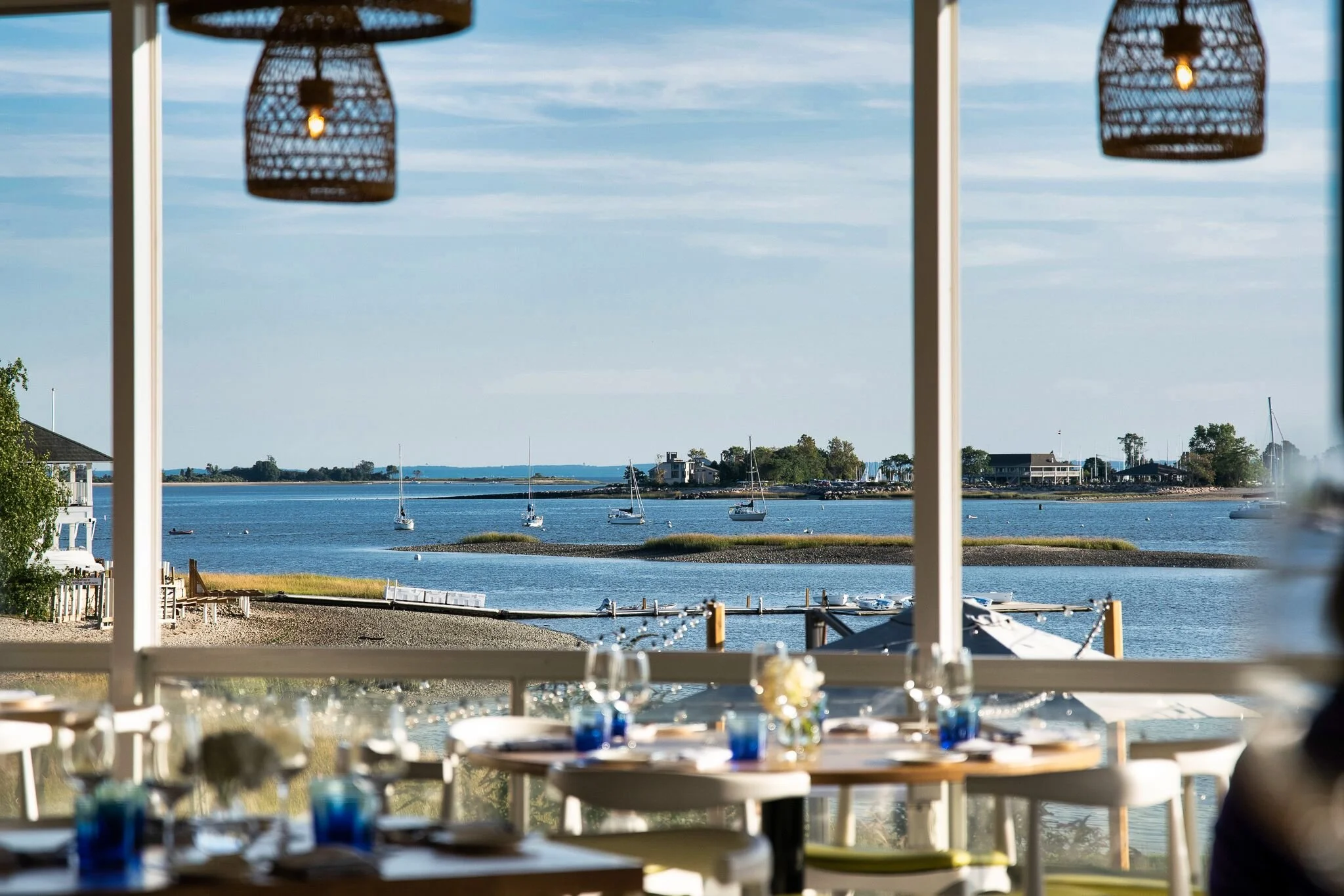 La Plage waterfront restaurant dining room at The Inn at Longshore with views of Long Island Sound