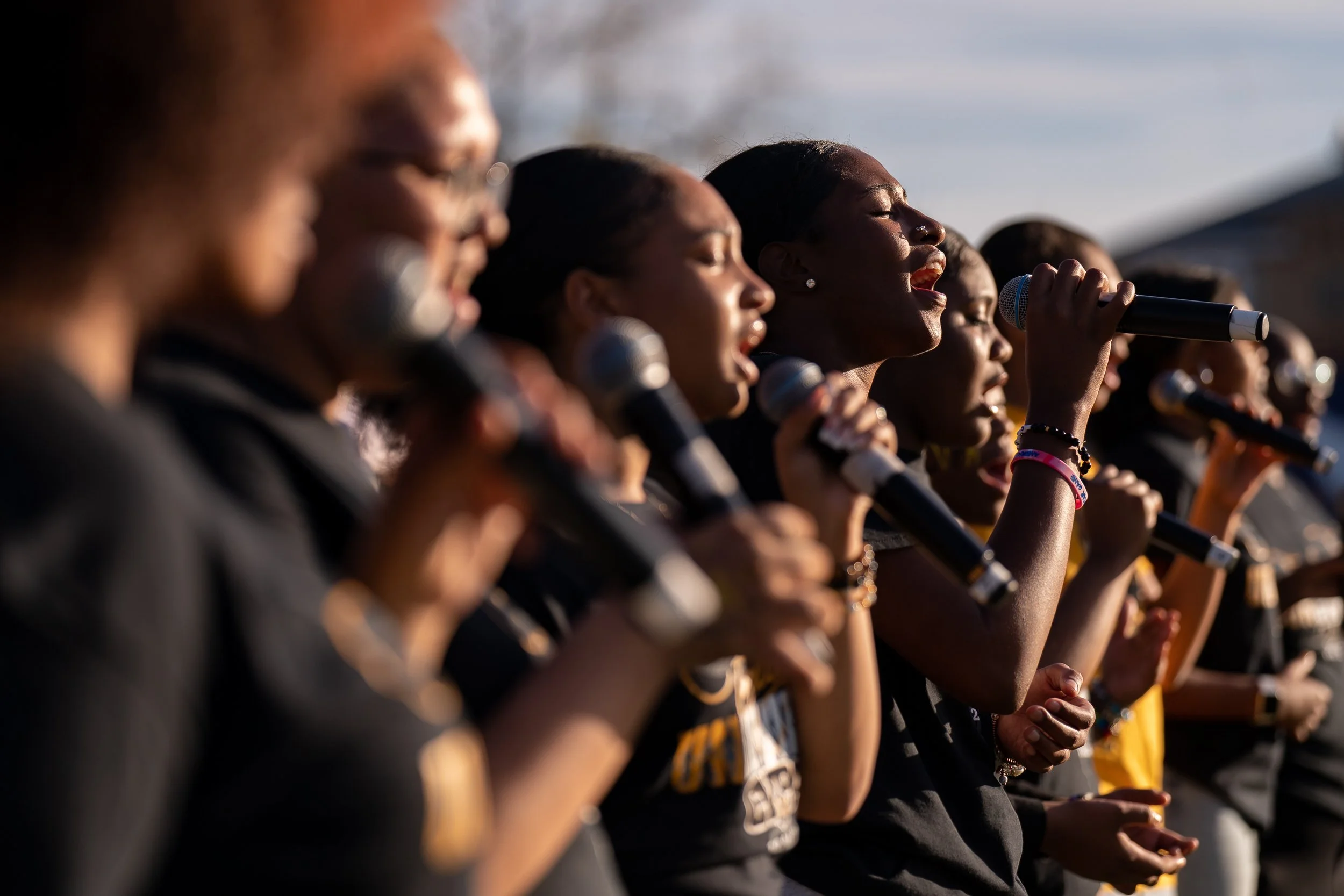 Central Visual & Performing Arts High School senior Taneyia Ingram, center, leads CVPA singers in singing the song “Rise Up” during the “Family Undivided” event organized by students of CVPA on Sunday, Nov. 6, 2022, at the school. The event was