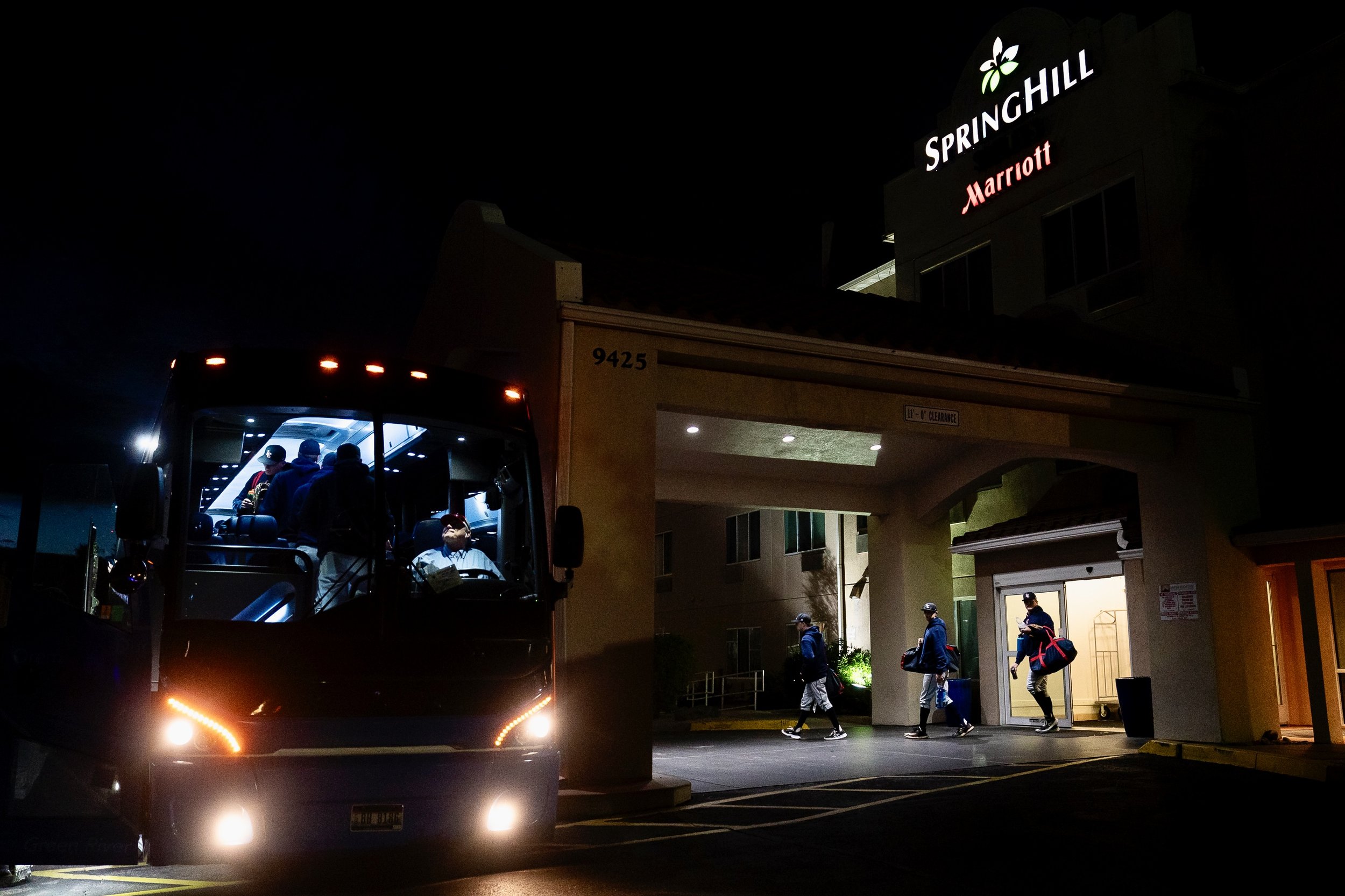 Members of the Lewis-Clark State College baseball team walk onto the team bus Thursday morning outside of the Springfield Marriott in Phoenix, Ariz.