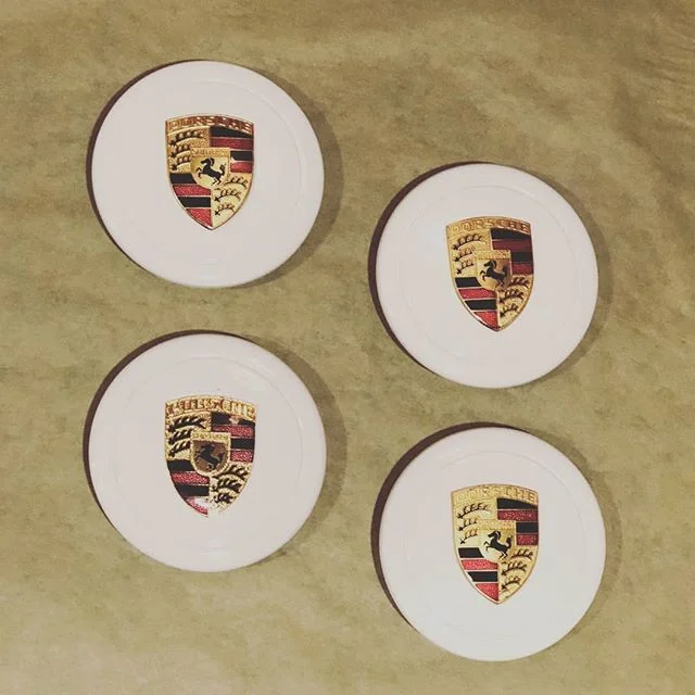 Fresh out of the oven! Fuchs alloy center caps painted Grandprix White with 356 hood badges attached. 😍 #porsche #porsche911 #aircooled