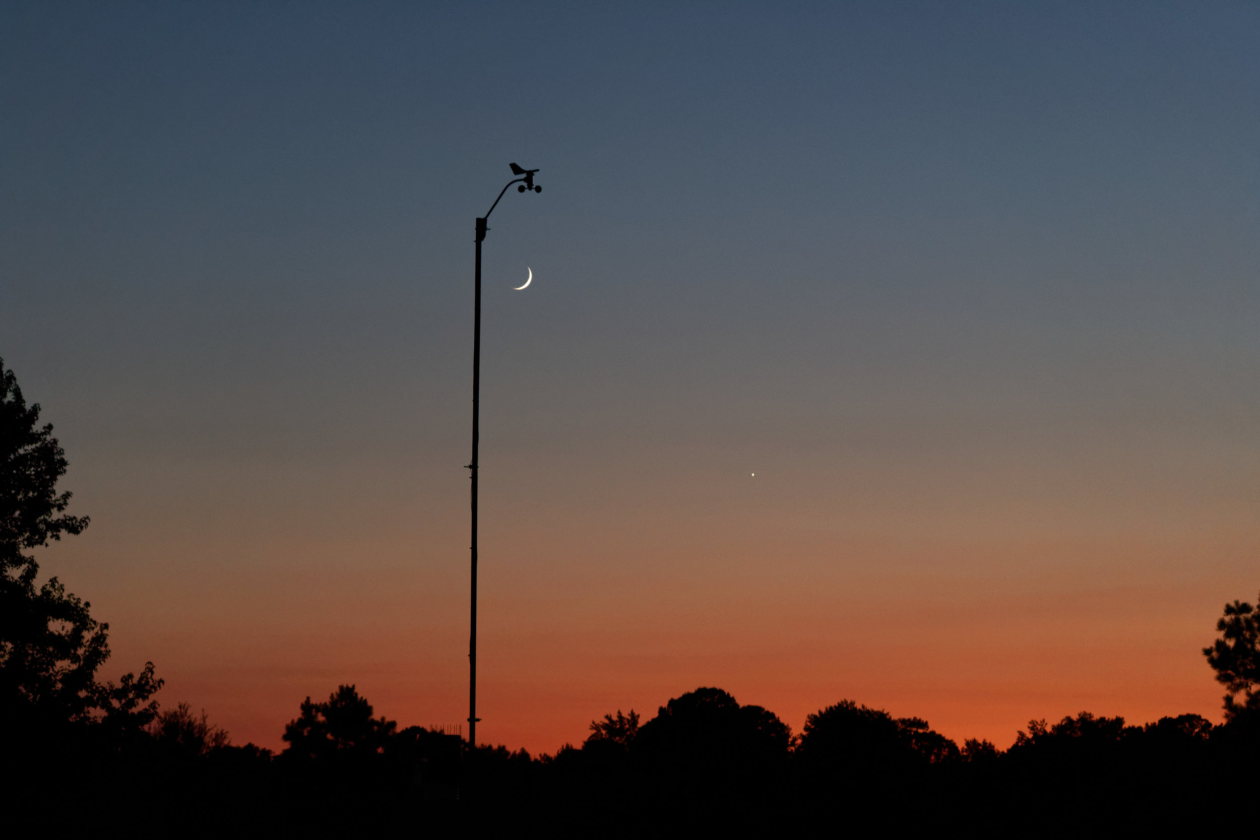 Crescent Moon and Weather Station at Sunset