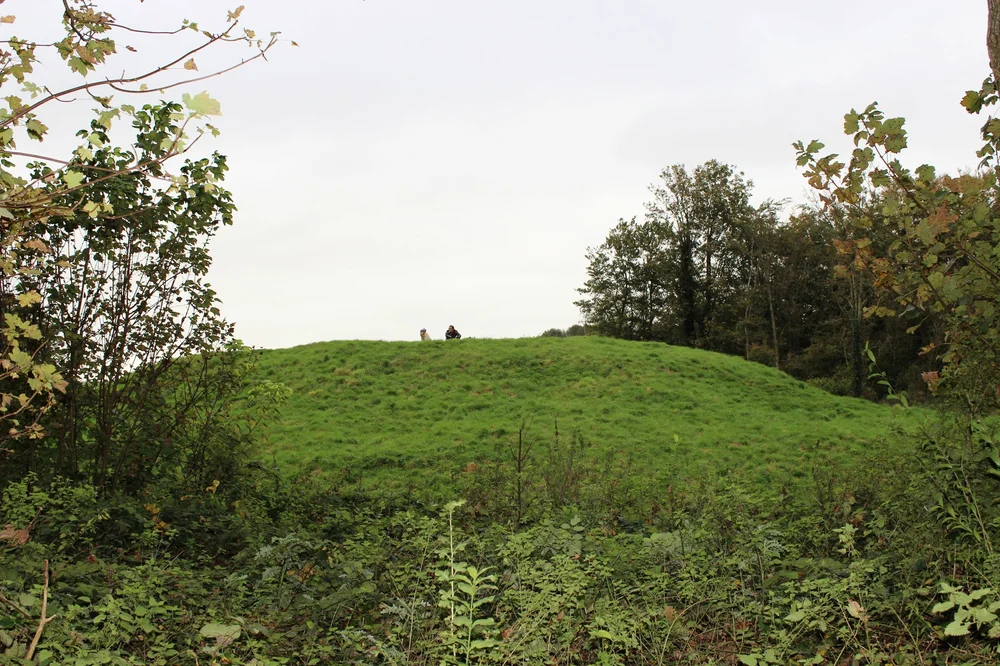 Couple Sitting on Mound