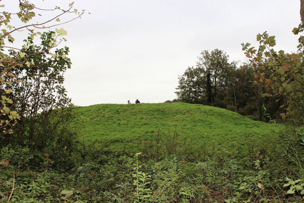 Couple Sitting on Mound
