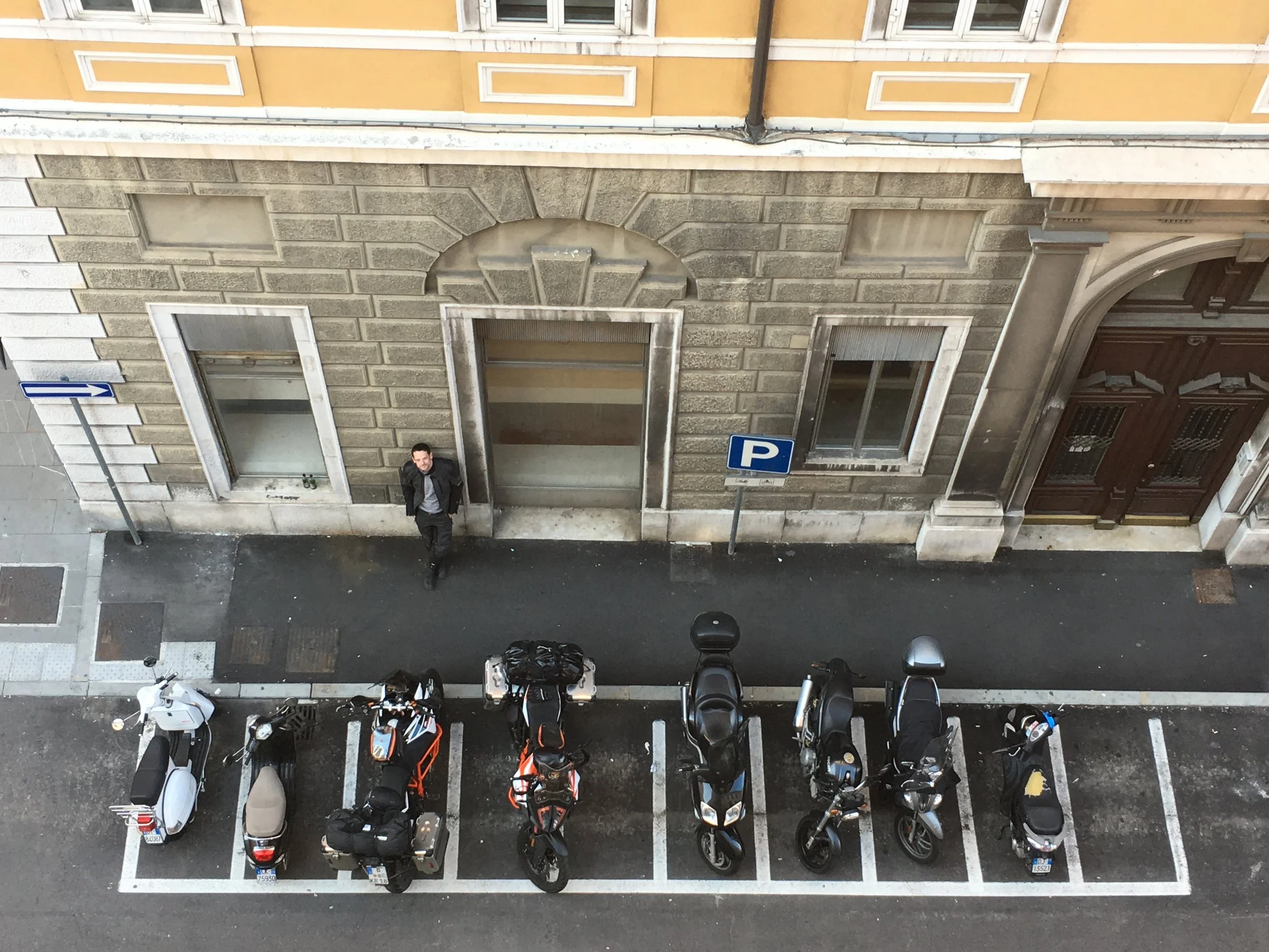 Motorcycle parking areas in the city center. Bravo, Italy!