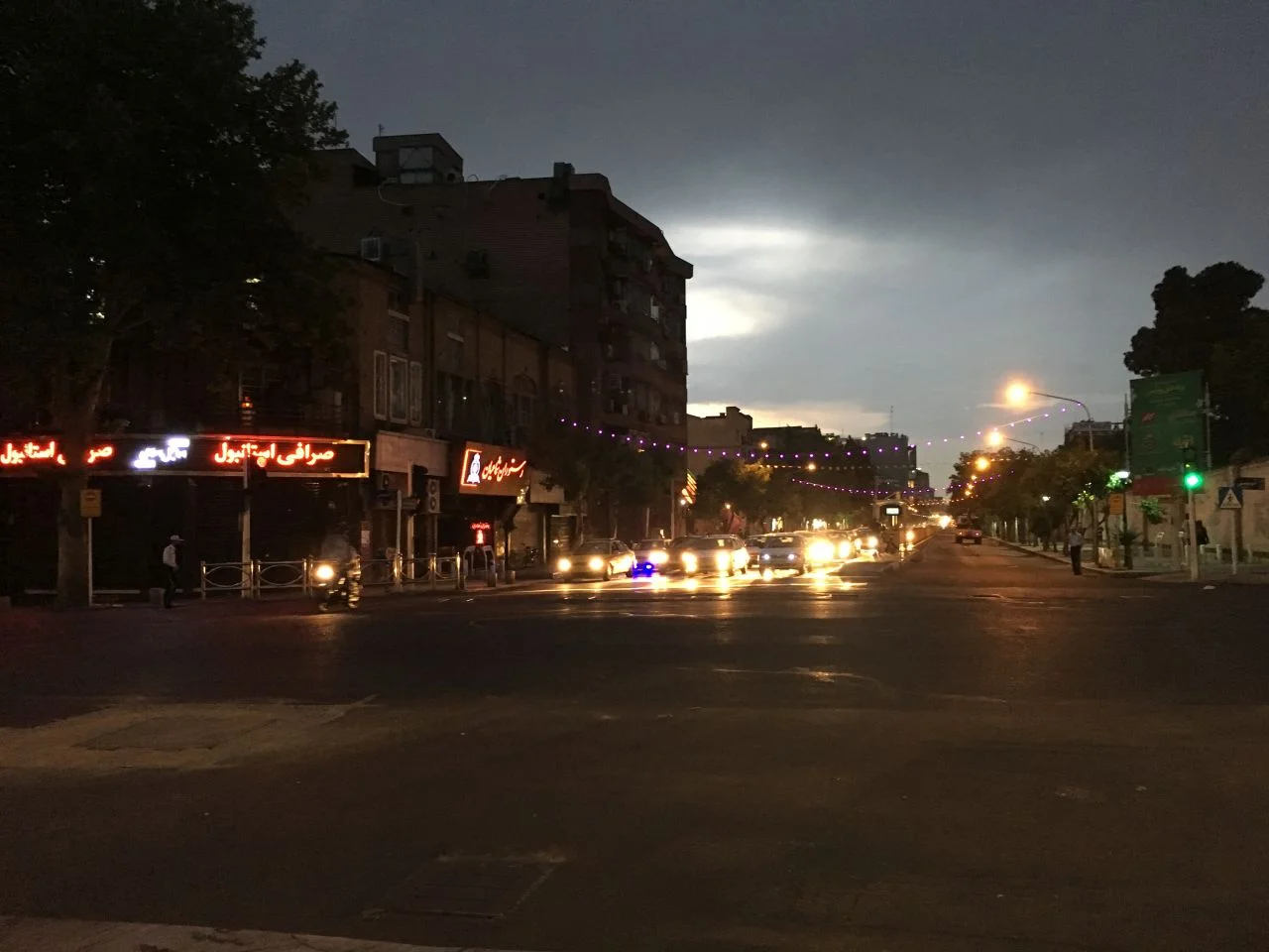 Teheran by night. Driving goes by one ruke: survival of the fastest.