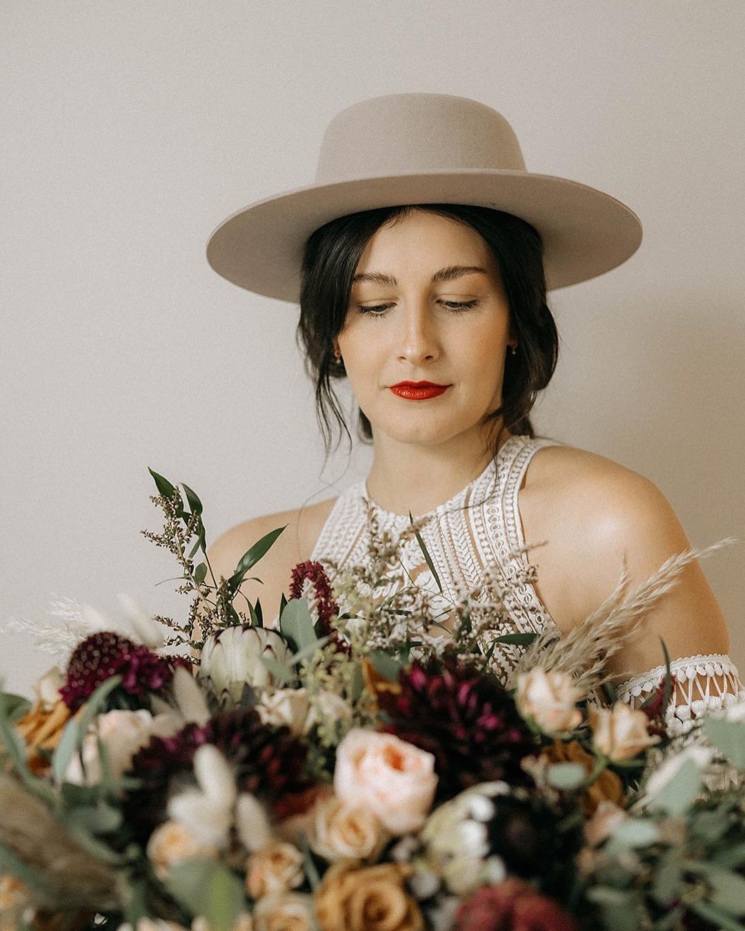  boho wedding , boho bride , backyard wedding ,  micro wedding , pampas grass , burgundy flowers , large bridal bouquet , arch flowers , arch , ceremony, bunny tails , dry flowers , pampas grass , dried flowers , dried bouquets , bouquet , ajr design