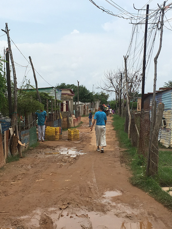 Barranquitas, Maracaibo. It is estimated 30% of the town's 12,000 or so inhabitants are affected by Huntington's disease. Few families lack a history of the disease. Most of HD families are very poor and have illegally occupied land that floods when it rains. Stagnant water, lack of sewage treatments, and lack of proper nutrition leads to severe health issues for these people.
