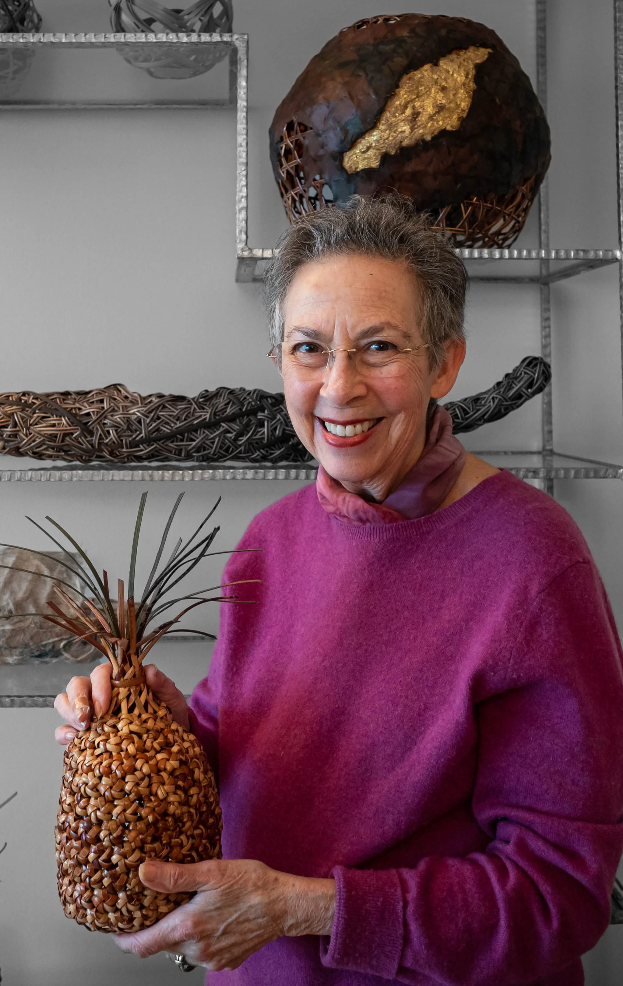 Barbara Head shot with baskets cropped.jpg