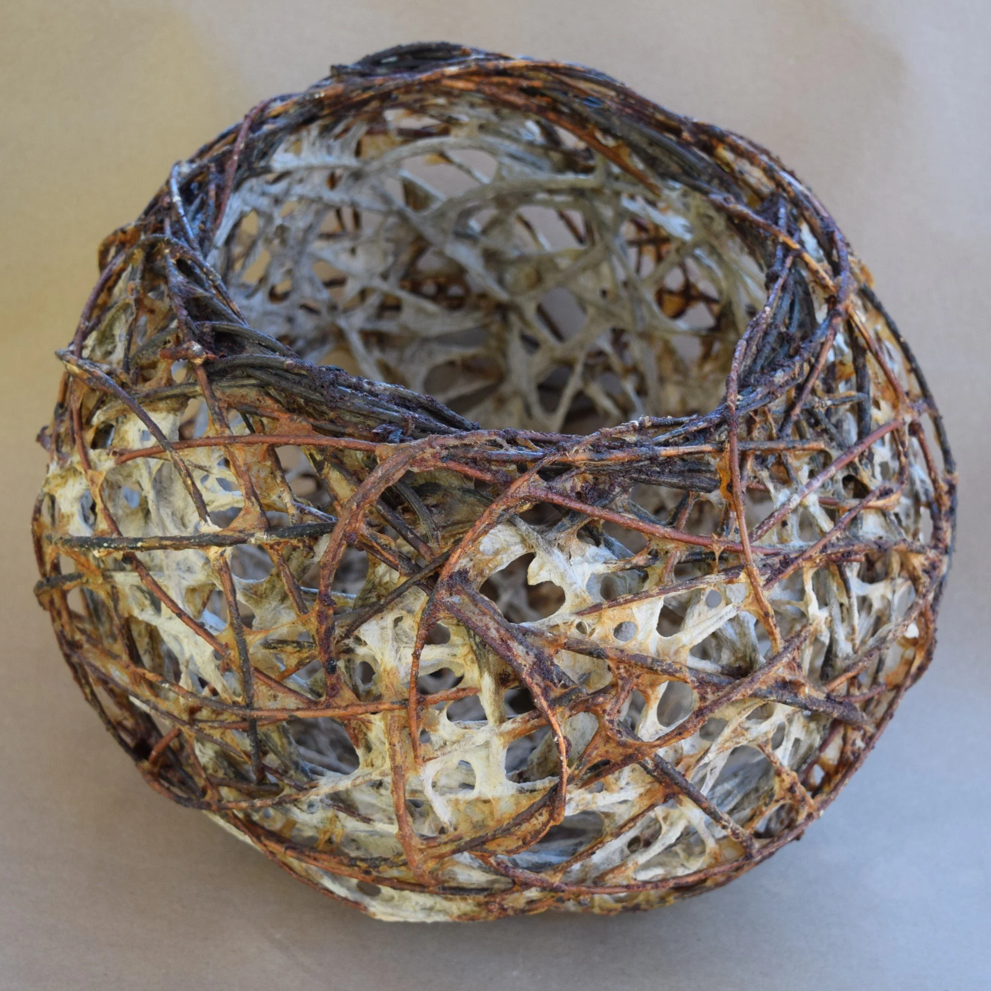 An Offering for Nymph Pitys - sculptural random weave willow, handmade paper pulp and pine resins