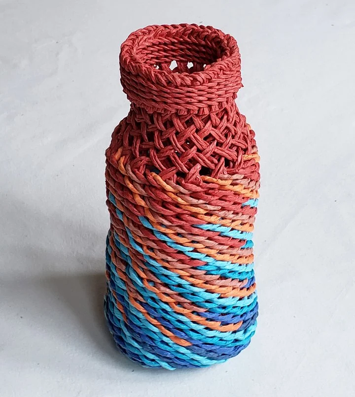 Fire & Ice #7, 2025.  Cords made from paper ribbon.  Single-course twining and plain oblique twining (POT).
