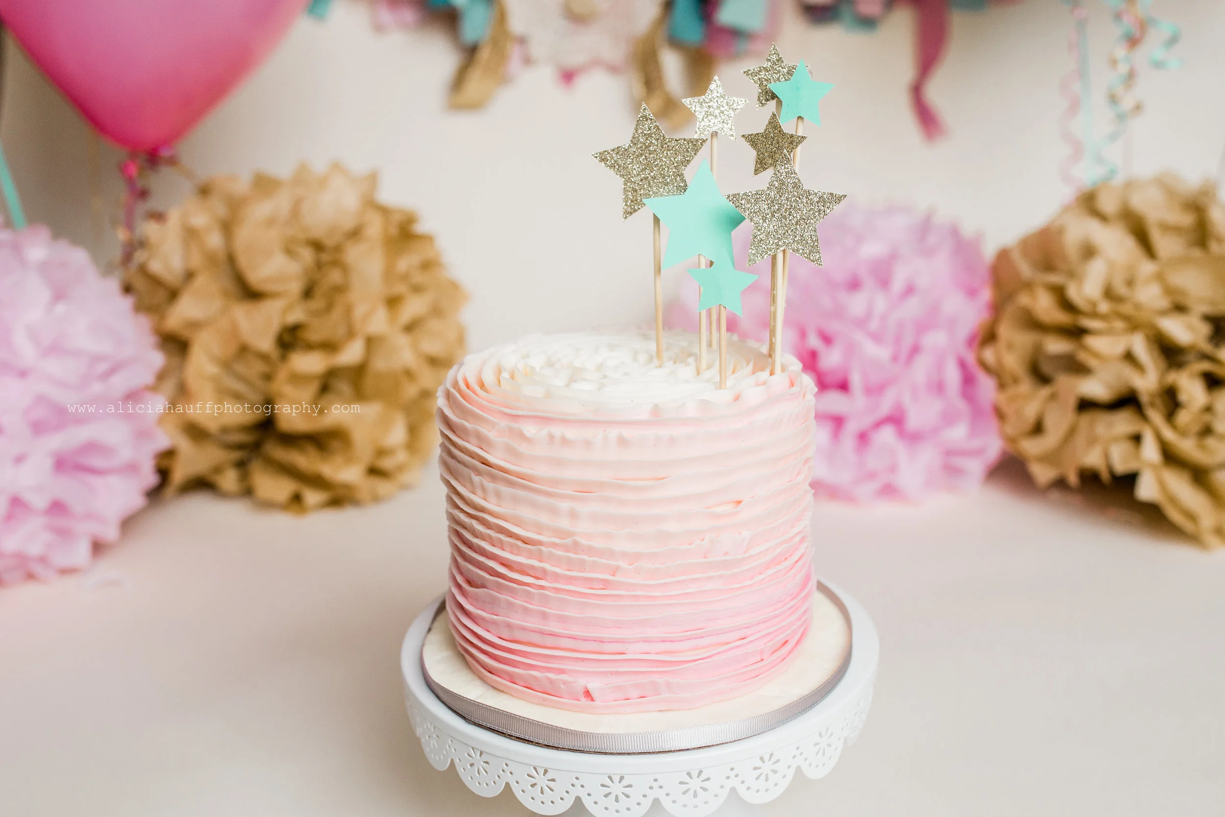 Amara's teal and pink cake smash