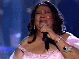 aretha-wig-off.gif
