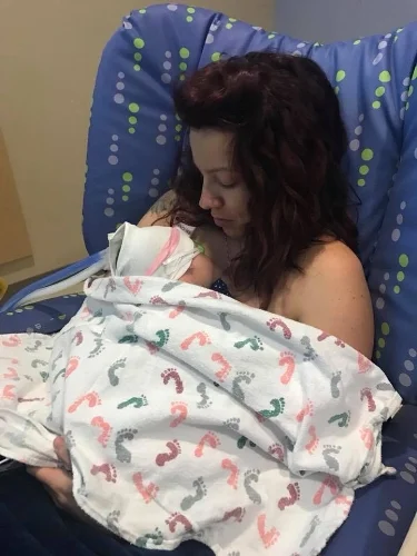 first time holding charly (1).jpg