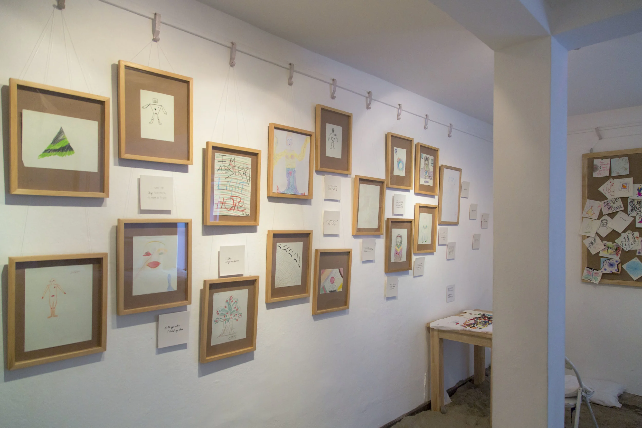Self portraits by ensemble and exhibition visitors.