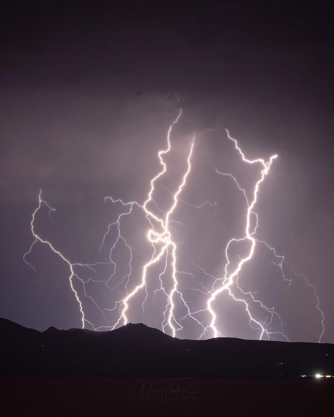 This is a combination of two exposures taken about 30 seconds apart. I think this image shows just how intricate the structure of these bolts can get if the conditions are right. These particular bolts were on the leading edge of a massive storm fron