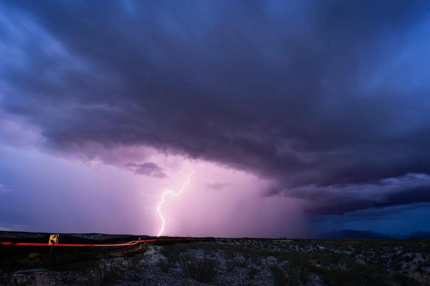 Back in July, I was lucky enough to capture some images of light trails from cars driving along the leading edge of a storm cell. These are my two favorites from that storm.