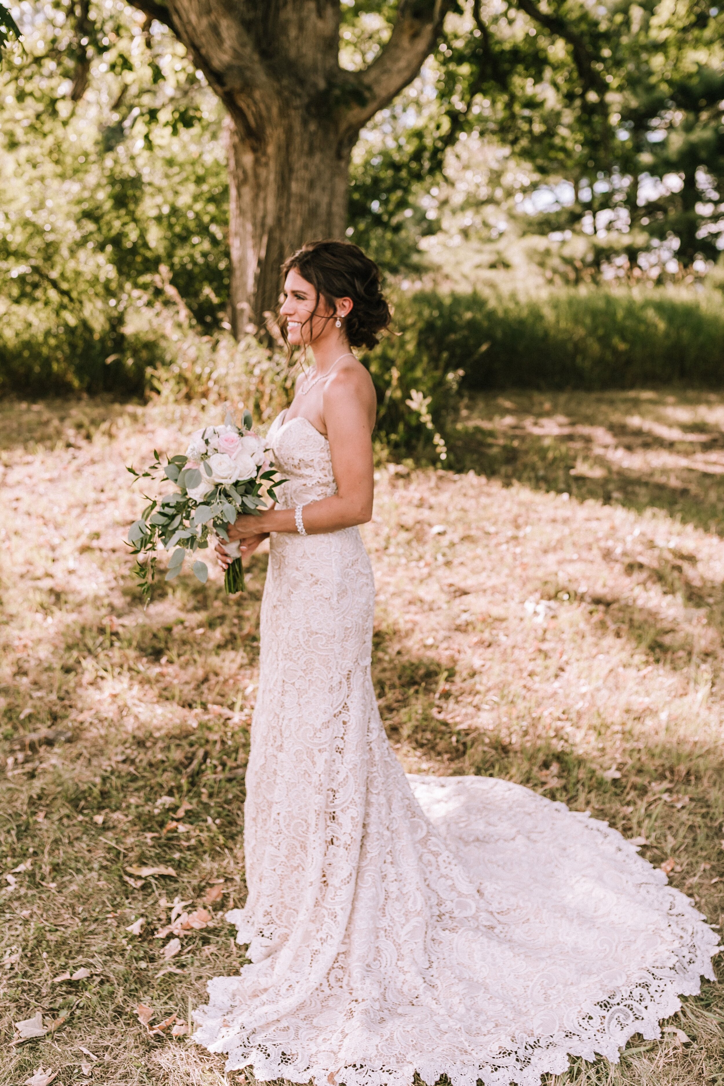 pretty bride lace dress smiling