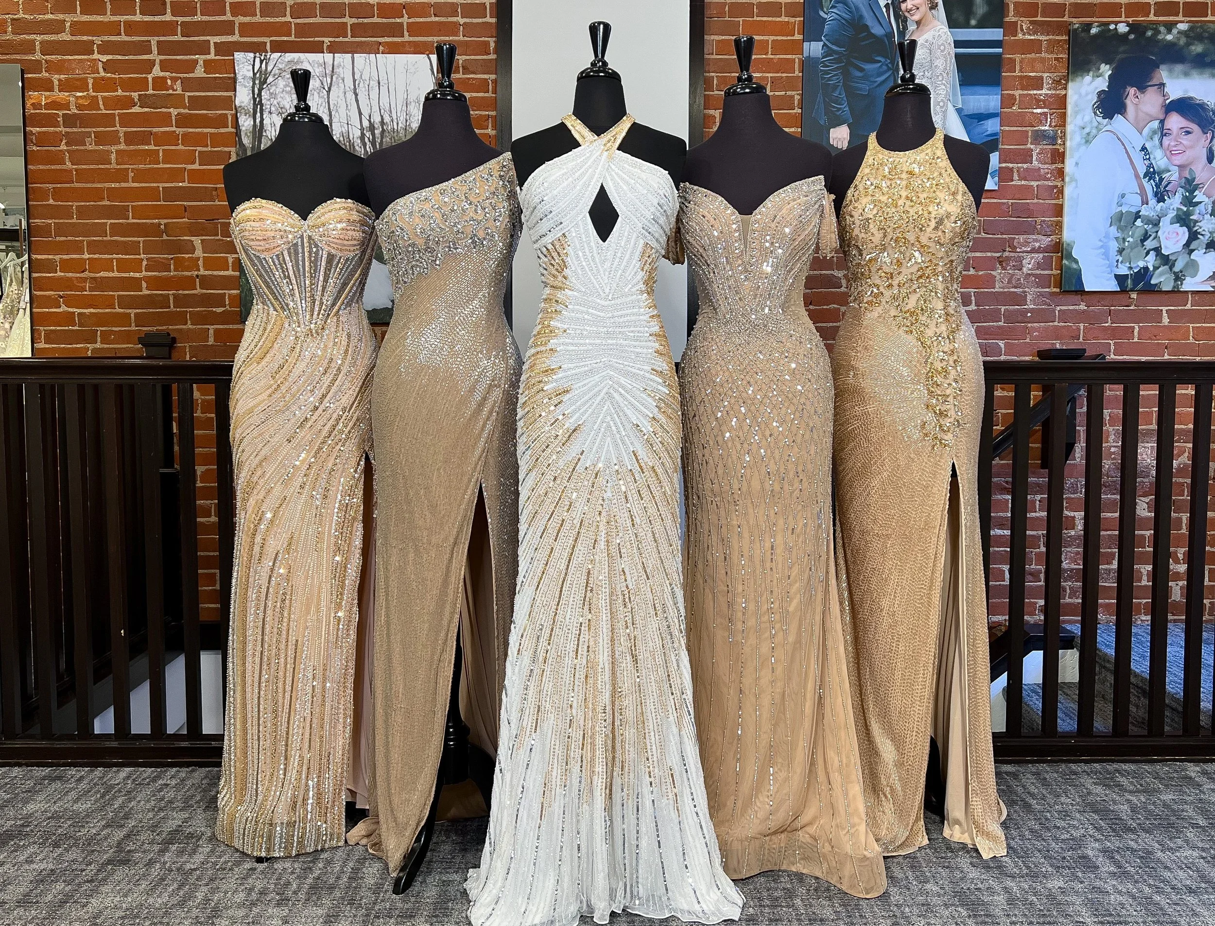 5 different purple pageant dresses from inside the store on mannequins.