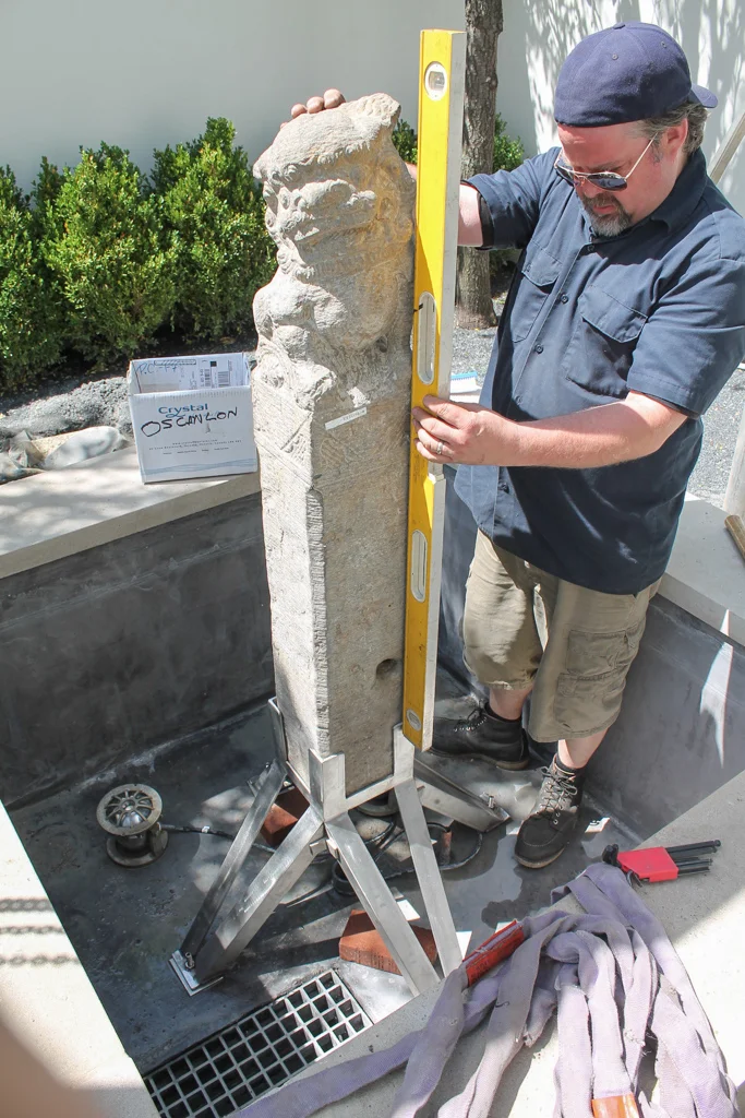 Ensuring perfect placement of the sculpture.