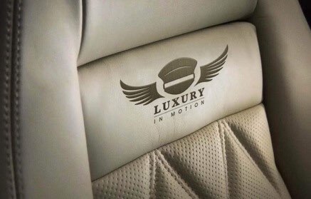 Luxury-in-motion-chauffeur-service-surrey-benefits-leather-seat-logo.jpg