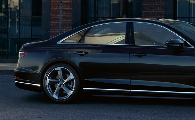 Luxury-in-motion-chauffeur-service-surrey-our-vehicles-audi-a8-dynamic-exterior-design-image.jpg
