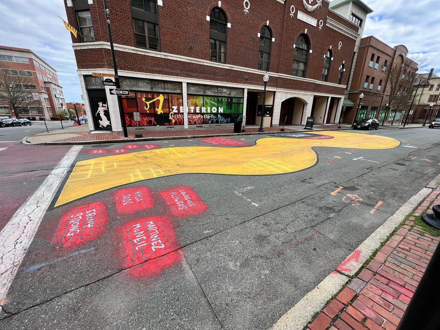 Amazingly cool street art outside the theatre! #wehaveayellowbrickroad #easeondowntheroad #thewiz #nbft #thezeiterion #lightingdesign